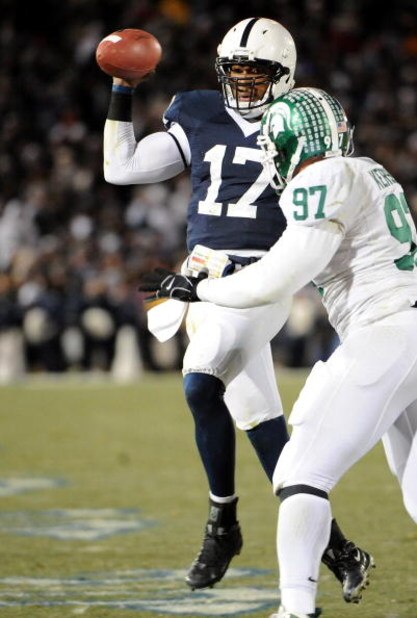 STATE COLLEGE, PA - NOVEMBER 22:  Darryl Clark #17 of the Penn State Nittany Lions scrambles in front of Justin Kershaw #97 of the Michigan State Spartans on November 22, 2008 at Beaver Stadium in State College, Pennsylvania. Penn State won the game 49-18