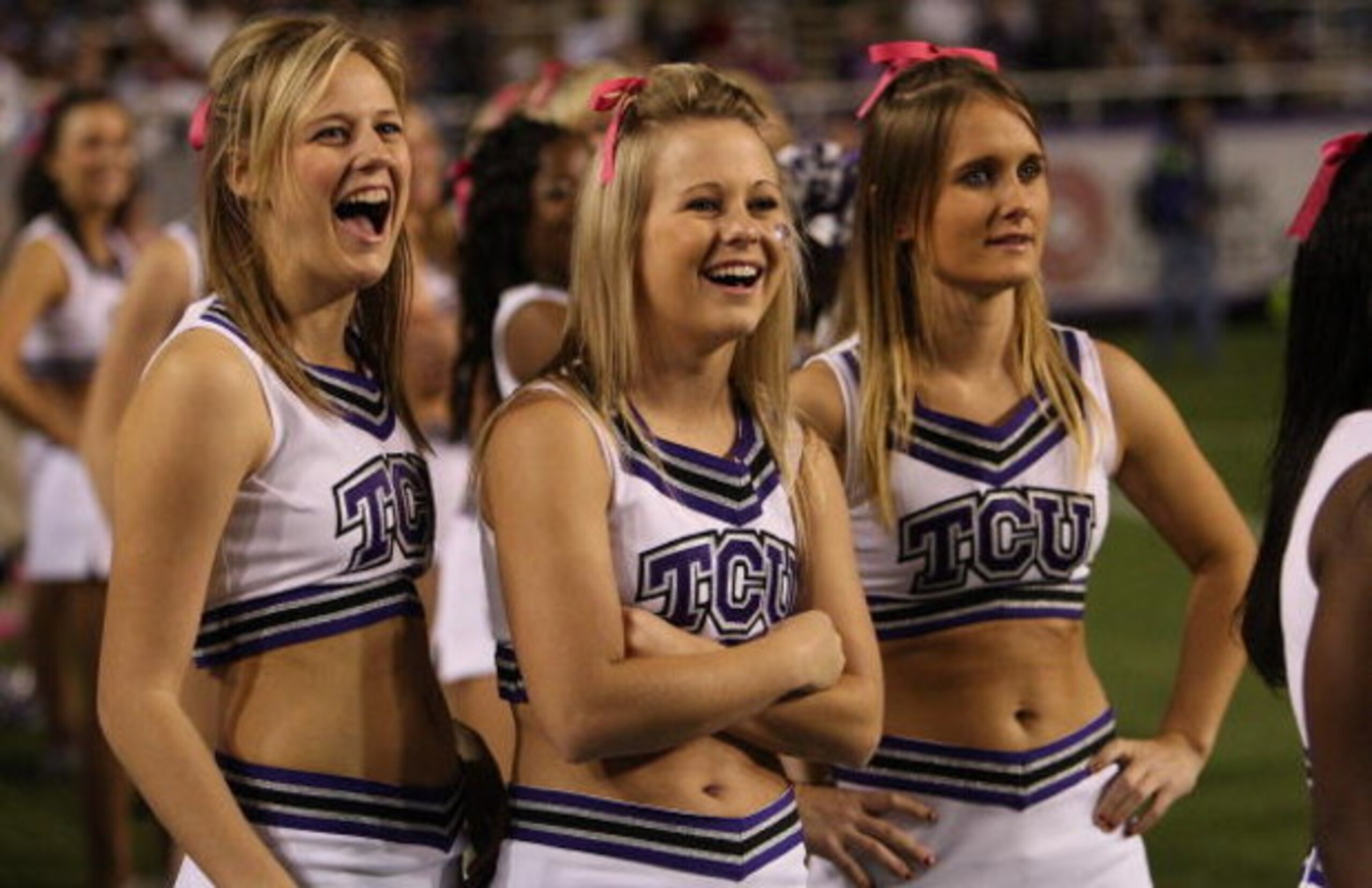 FORT WORTH, TX - OCTOBER 16: TCU Horned Frogs cheerleaders wear pink ribbons for Breast Cancer Awareness month during play against the BYU Cougars at Amon G. Carter Stadium on October 16, 2008 in Fort Worth, Texas. (Photo by Ronald Martinez/Getty Images FORT WORTH, TX - OCTOBER 16: TCU Horned Frogs cheerleaders wear pink ribbons for Breast Cancer Awareness month during play against the BYU Cougars at Amon G. Carter Stadium on October 16, 2008 in Fort Worth, Texas. (Photo by Ronald Martinez/Getty Images