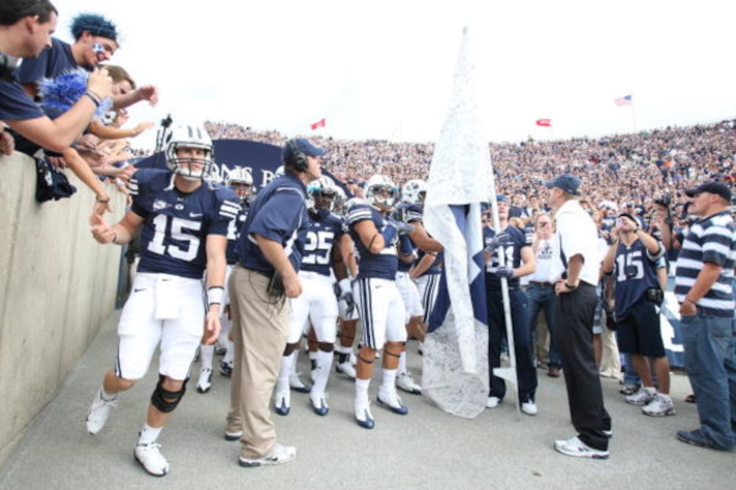 PROVO, UT. - SEPTEMBER 19: Max Hall #15 of the Brigham Young Cougars enters the stadium while the rest of the team waits to be announced before a game against the Florida State Seminoles at La Vell Edwards Stadium on September 19, 2009 in Provo, Utah. ( PROVO, UT. - SEPTEMBER 19: Max Hall #15 of the Brigham Young Cougars enters the stadium while the rest of the team waits to be announced before a game against the Florida State Seminoles at La Vell Edwards Stadium on September 19, 2009 in Provo, Utah. (