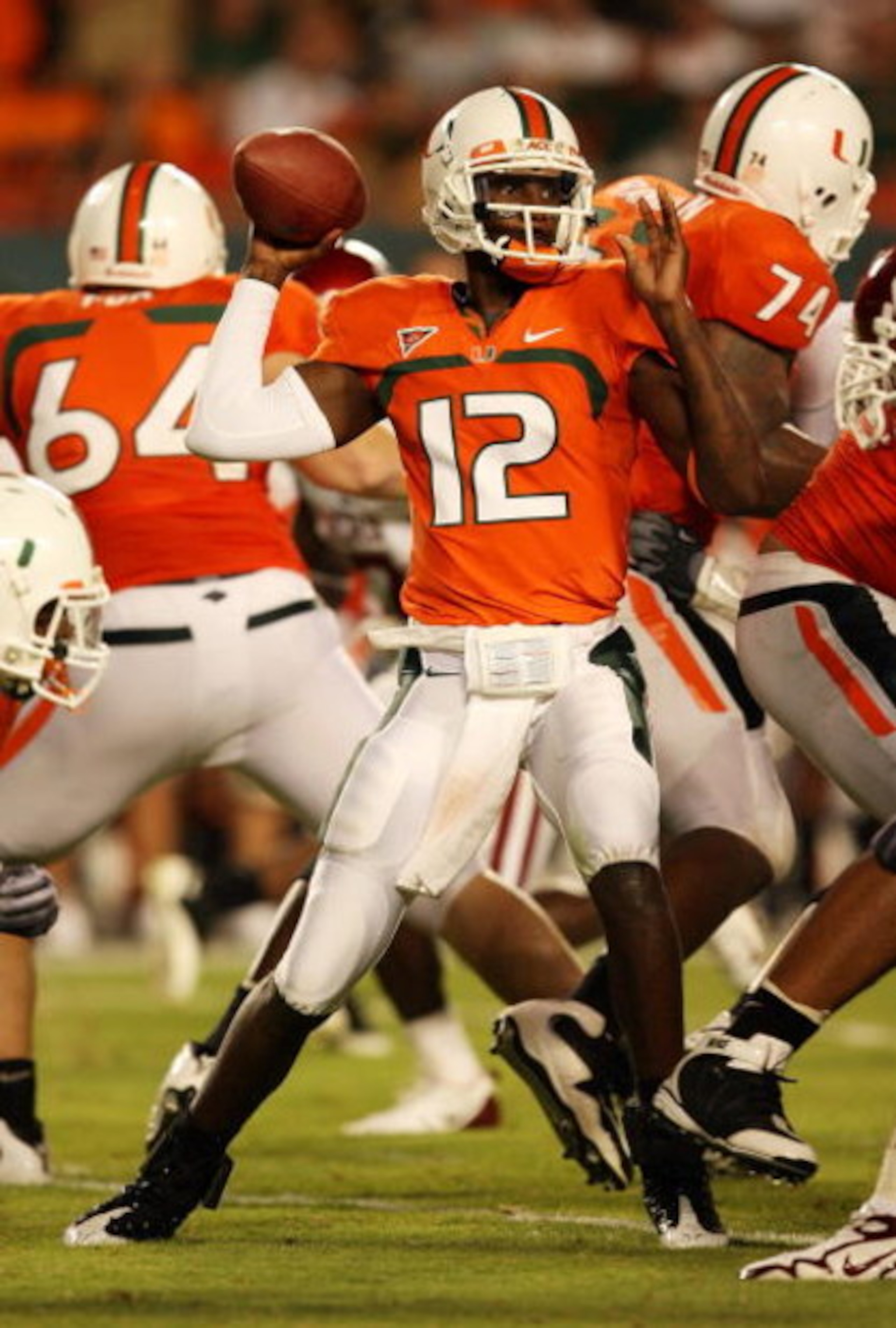 FORT LAUDERDALE, FL - OCTOBER 03: Quarterback Jacory Harris #12 of the Miami Hurricanes throws a pass against the Oklahoma Sooners at Land Shark Stadium on October 3, 2009 in Fort Lauderdale, Florida. Miami defeated Oklahoma 21-20. (Photo by Doug Benc/Get FORT LAUDERDALE, FL - OCTOBER 03: Quarterback Jacory Harris #12 of the Miami Hurricanes throws a pass against the Oklahoma Sooners at Land Shark Stadium on October 3, 2009 in Fort Lauderdale, Florida. Miami defeated Oklahoma 21-20. (Photo by Doug Benc/Get