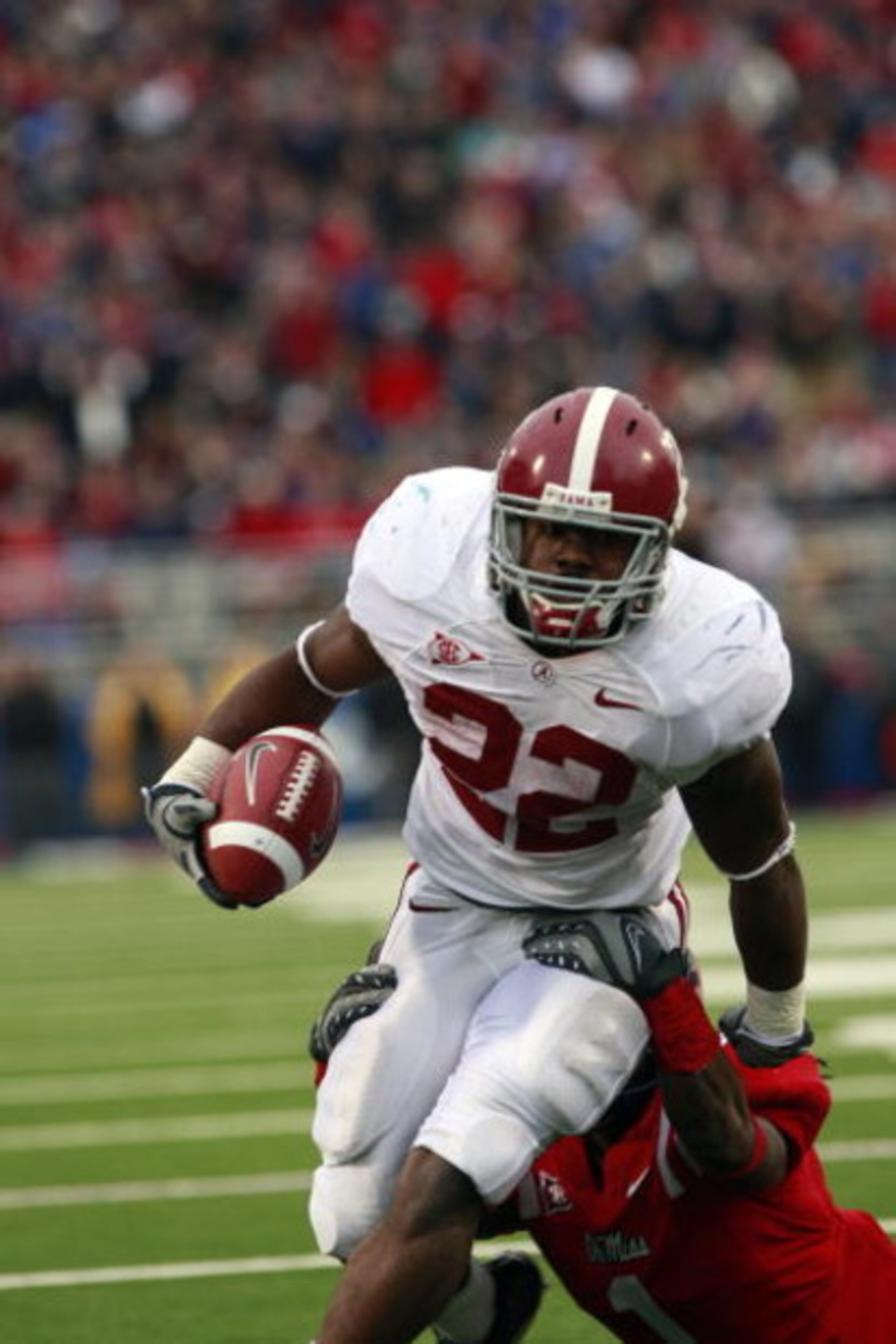 OXFORD, MS - OCTOBER 10: Mark Ingram #22 of the Alabama Crimson Tide runs for yardage in their college football game against the Mississippi Rebels at Vaught-Hemingway Stadium on October 10, 2009 in Oxford, Mississippi. (Photo by Dave Martin/Getty Images) OXFORD, MS - OCTOBER 10: Mark Ingram #22 of the Alabama Crimson Tide runs for yardage in their college football game against the Mississippi Rebels at Vaught-Hemingway Stadium on October 10, 2009 in Oxford, Mississippi. (Photo by Dave Martin/Getty Images)