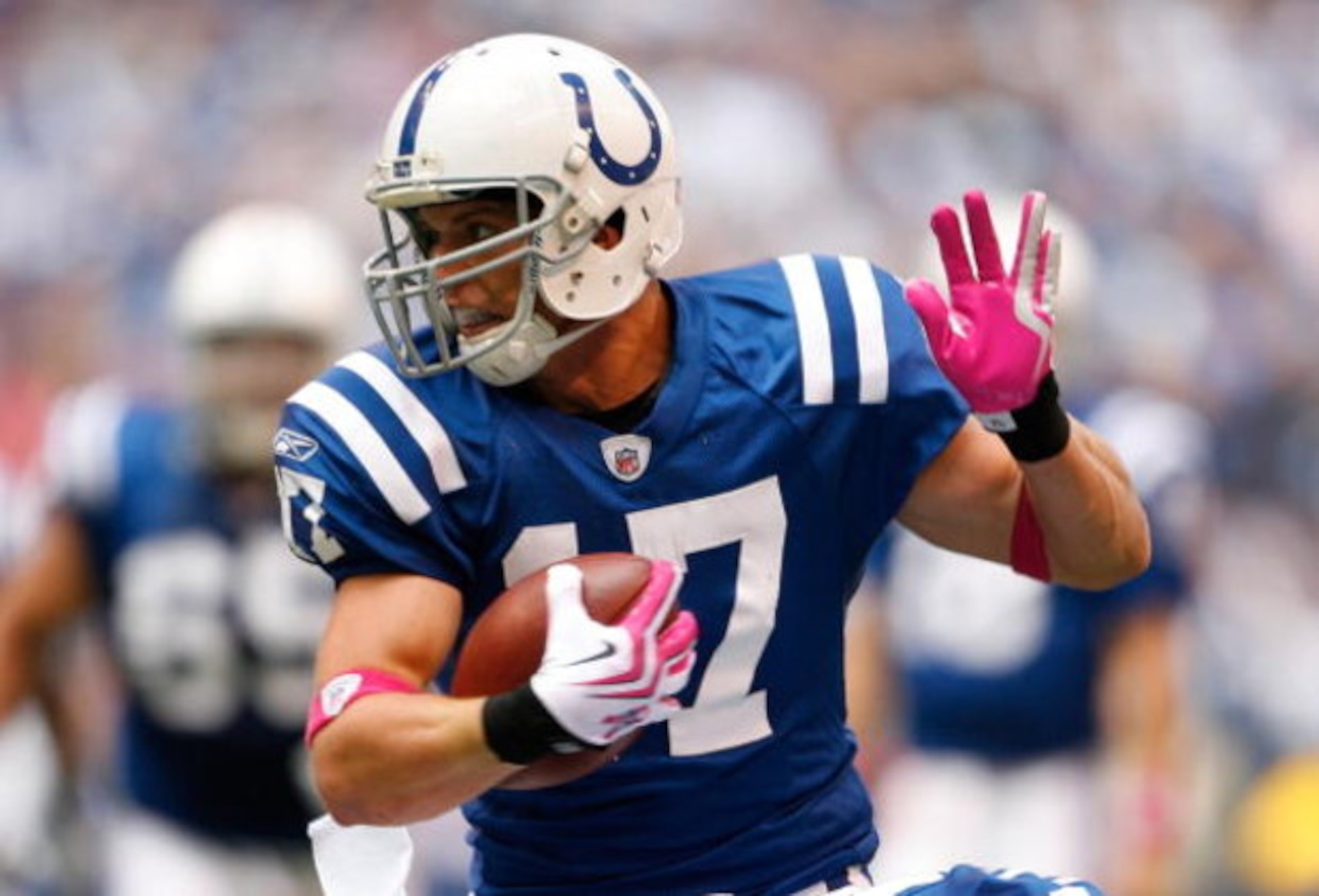 INDIANAPOLIS - OCTOBER 04:  Austin Collie #17 of the Indianapolis Colts runs with the ball during the NFL game against the Seattle Seahawks at Lucas Oil Stadium on October 4, 2009 in Indianapolis, Indiana.  (Photo by Andy Lyons/Getty Images)