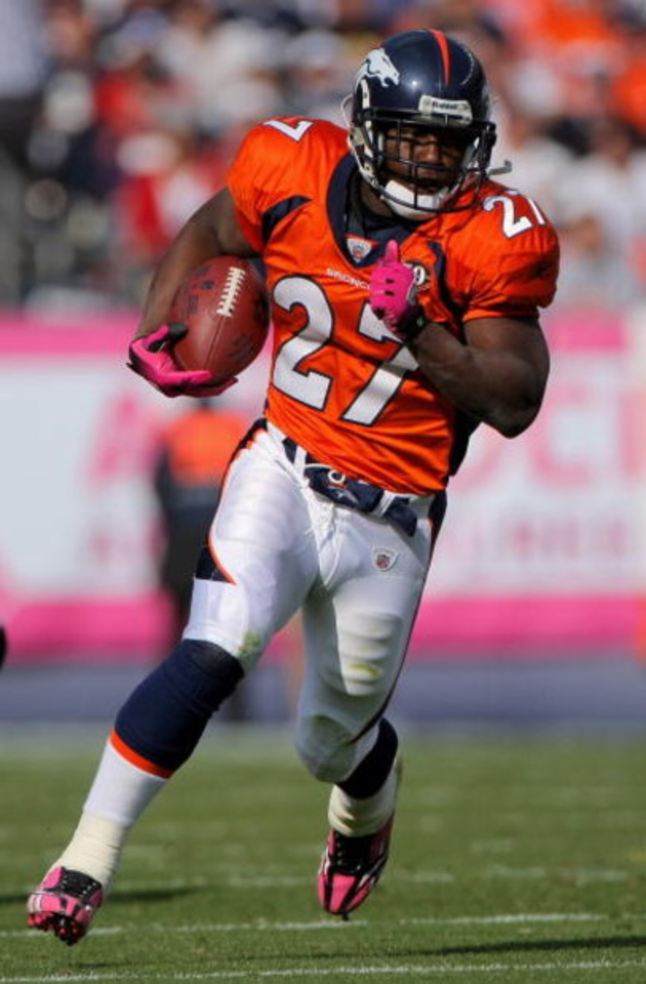 DENVER - OCTOBER 04:  Running back Knowshon Moreno #27 of the Denver Broncos rushes against the Dallas Cowboys during NFL action at Invesco Field at Mile High on October 4, 2009 in Denver, Colorado. The Broncos defeated the Cowboys 17-10.  (Photo by Doug 