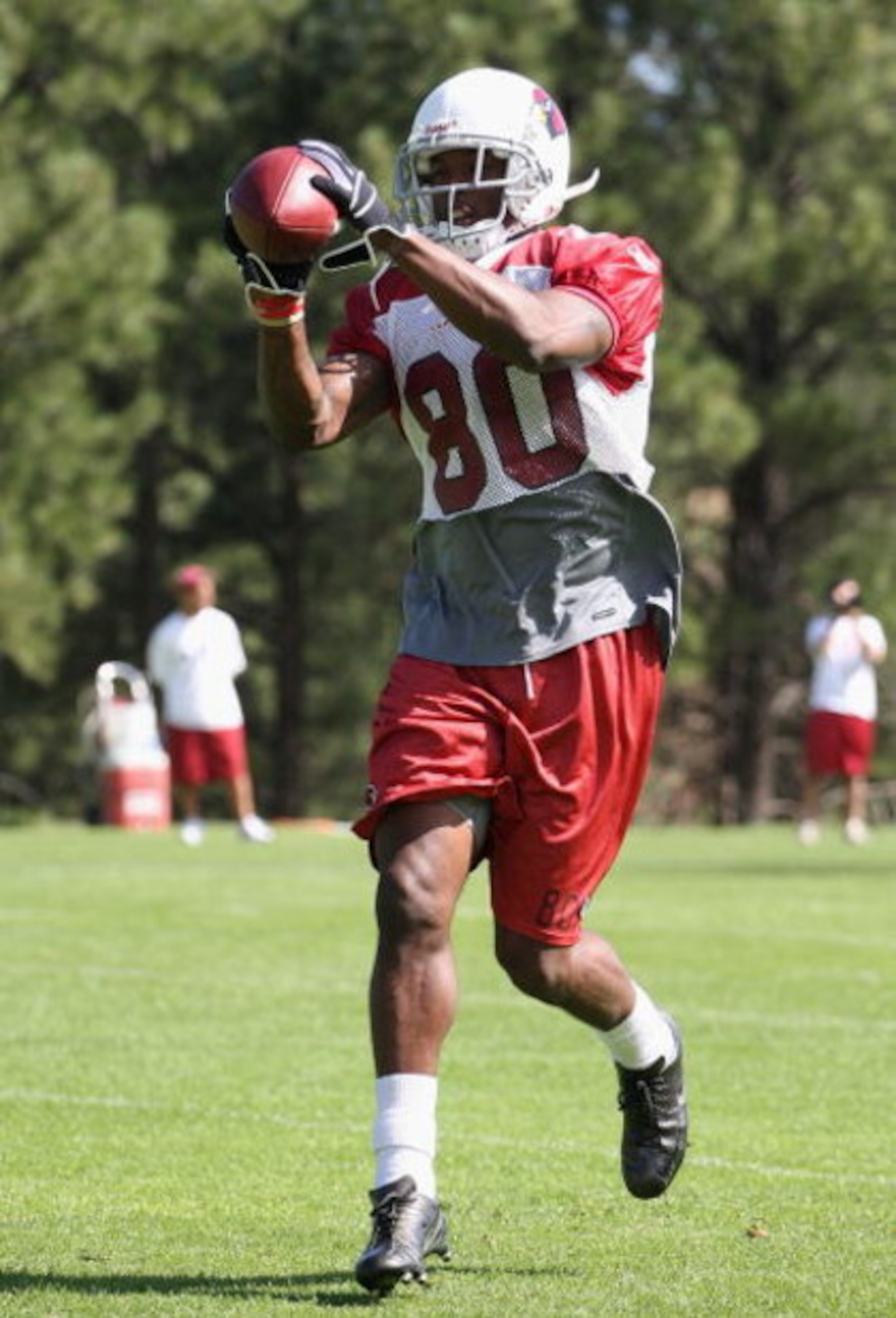 FLAGSTAFF, AZ - JULY 31:  Wide receiver Early Doucet #80 of the Arizona Cardinals catches the ball during the team training camp at Northern Arizona University on July 31, 2009 in Flagstaff, Arizona.  (Photo by Christian Petersen/Getty Images)
