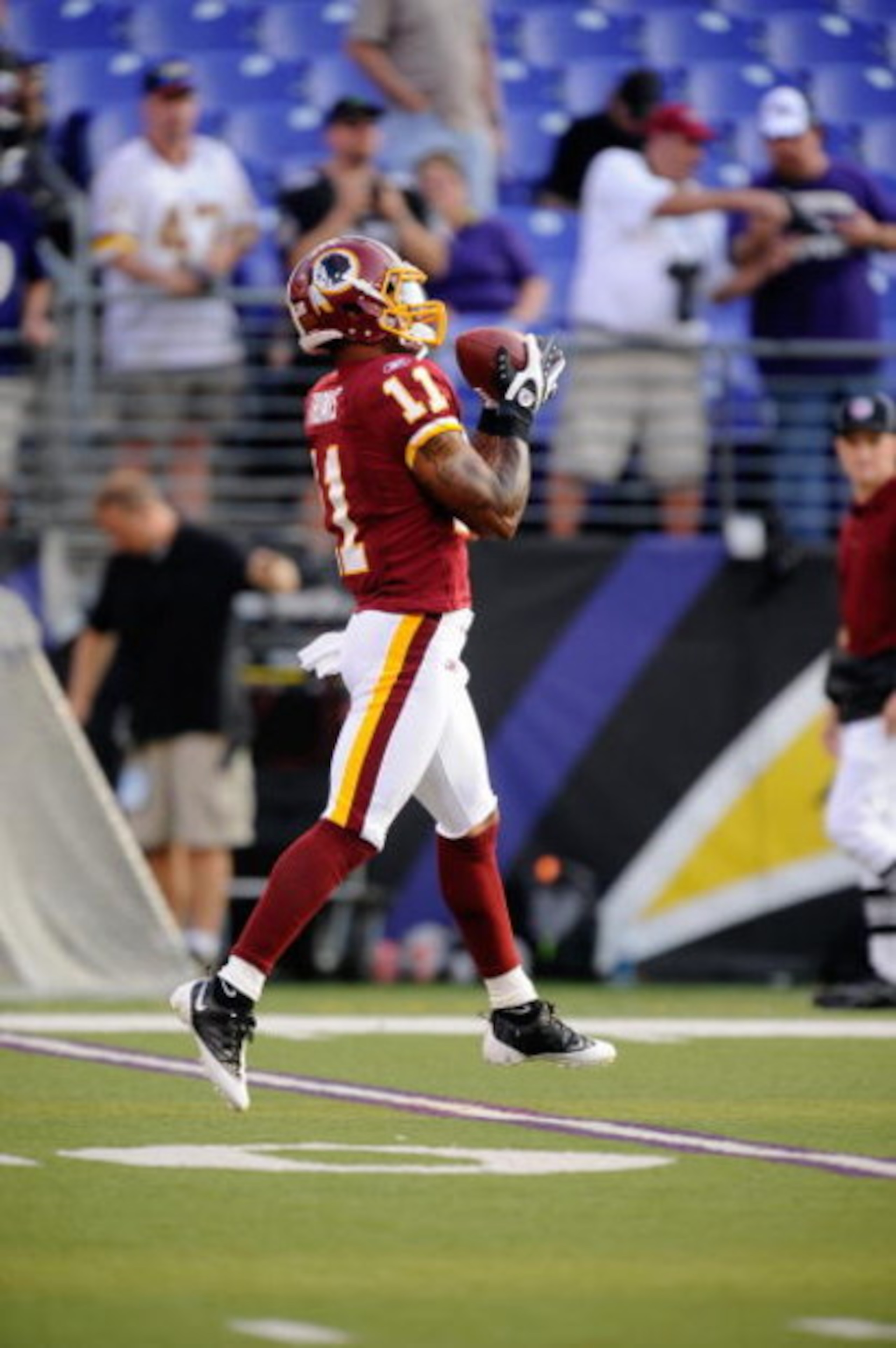 BALTIMORE, MD - AUGUST 13:  Devin Thomas #11 of the Washington Redskins makes a catch during warm ups of a NFL preseason football game against the Baltimore Ravens on August 13, 2009 at M & T Bank Stadium in Baltimore, Maryland.   (Photo by Mitchell Layto