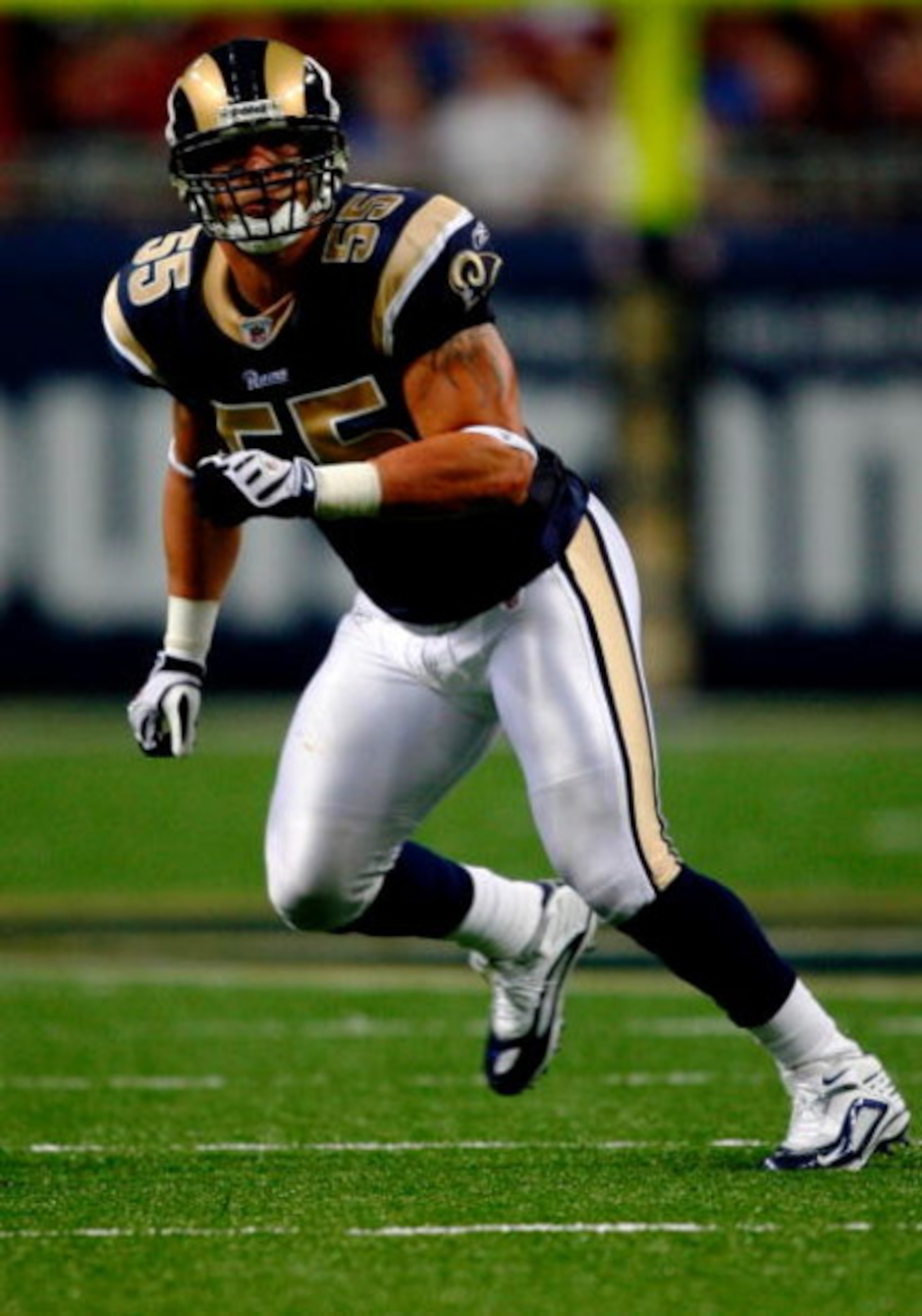 ST. LOUIS, MO - AUGUST 21:  Linebacker James Laurinaitis #55 of the St. Louis Rams follows the play against the Atlanta Falcons during the preseason game at the Edward Jones Dome on August 21, 2009 in St. Louis, Missouri. (Photo by Dilip Vishwanat/Getty I