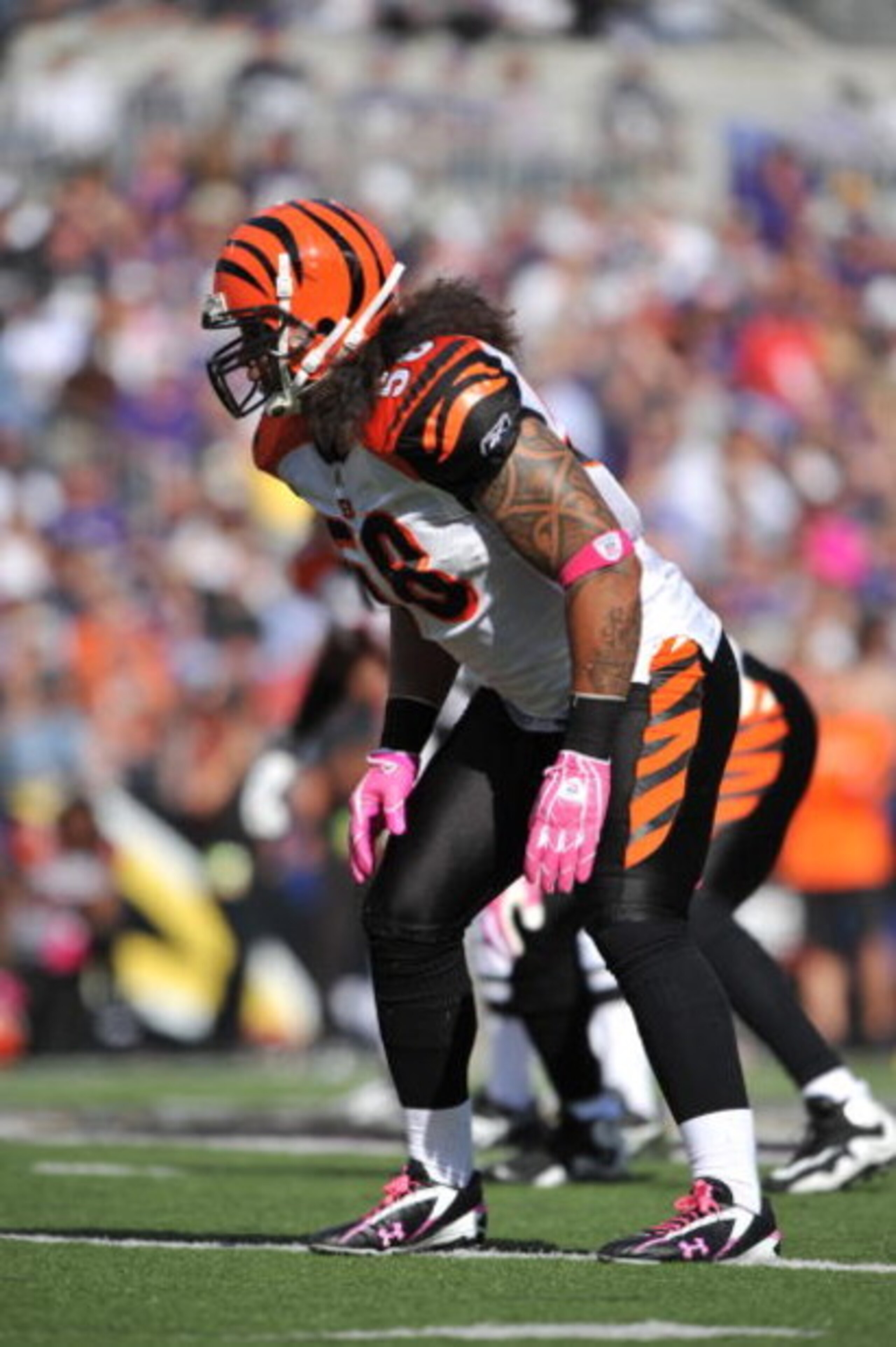 BALTIMORE - OCTOBER 11:  Rey Maualuga #58 of the Cincinnati Bengals defends against the Baltimore Ravens at M&T Bank Stadium on October 11, 2009 in Baltimore, Maryland. The Bengals defeated the Ravens 17-14. (Photo by Larry French/Getty Images)