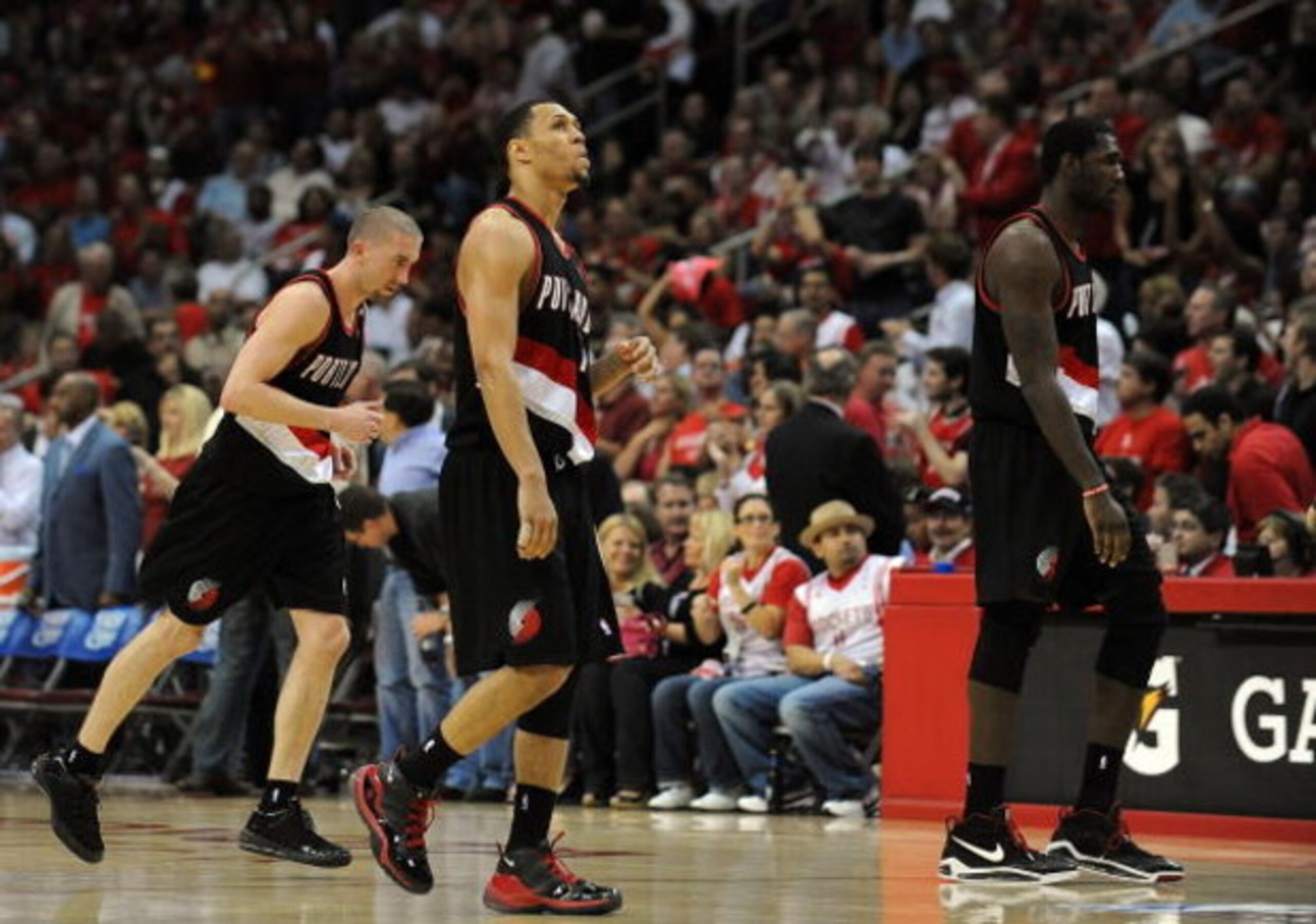HOUSTON - APRIL 30: Greg Oden #52, Brandon Roy #7 and Steve Blake #2 of the Portland Trail Blazers walk off the court during play against the Houston Rockets in Game Six of the Western Conference Quarterfinals during the 2009 NBA Playoffs at Toyota Cente HOUSTON - APRIL 30: Greg Oden #52, Brandon Roy #7 and Steve Blake #2 of the Portland Trail Blazers walk off the court during play against the Houston Rockets in Game Six of the Western Conference Quarterfinals during the 2009 NBA Playoffs at Toyota Cente