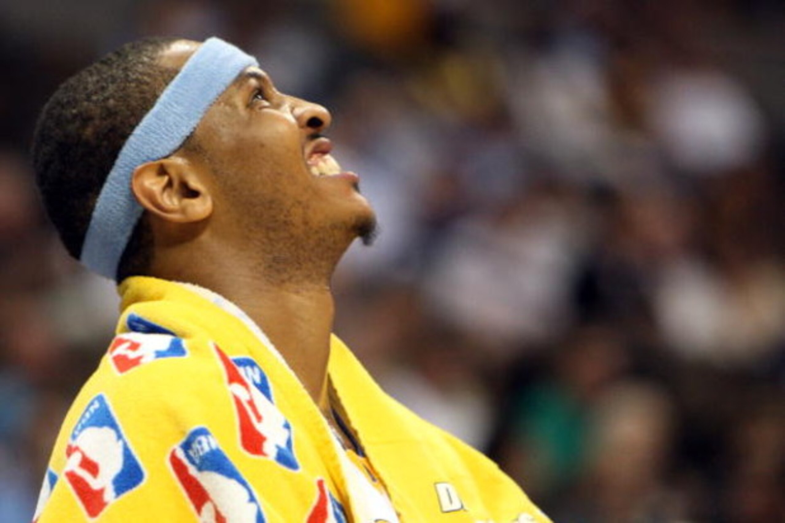 DENVER - MAY 29: Carmelo Anthony #15 of the Denver Nuggets looks on from the bench in the fourth quarter of Game Six of the Western Conference Finals during the 2009 NBA Playoffs against the Los Angeles Lakers at Pepsi Center on May 29, 2009 in Denver, C DENVER - MAY 29: Carmelo Anthony #15 of the Denver Nuggets looks on from the bench in the fourth quarter of Game Six of the Western Conference Finals during the 2009 NBA Playoffs against the Los Angeles Lakers at Pepsi Center on May 29, 2009 in Denver, C