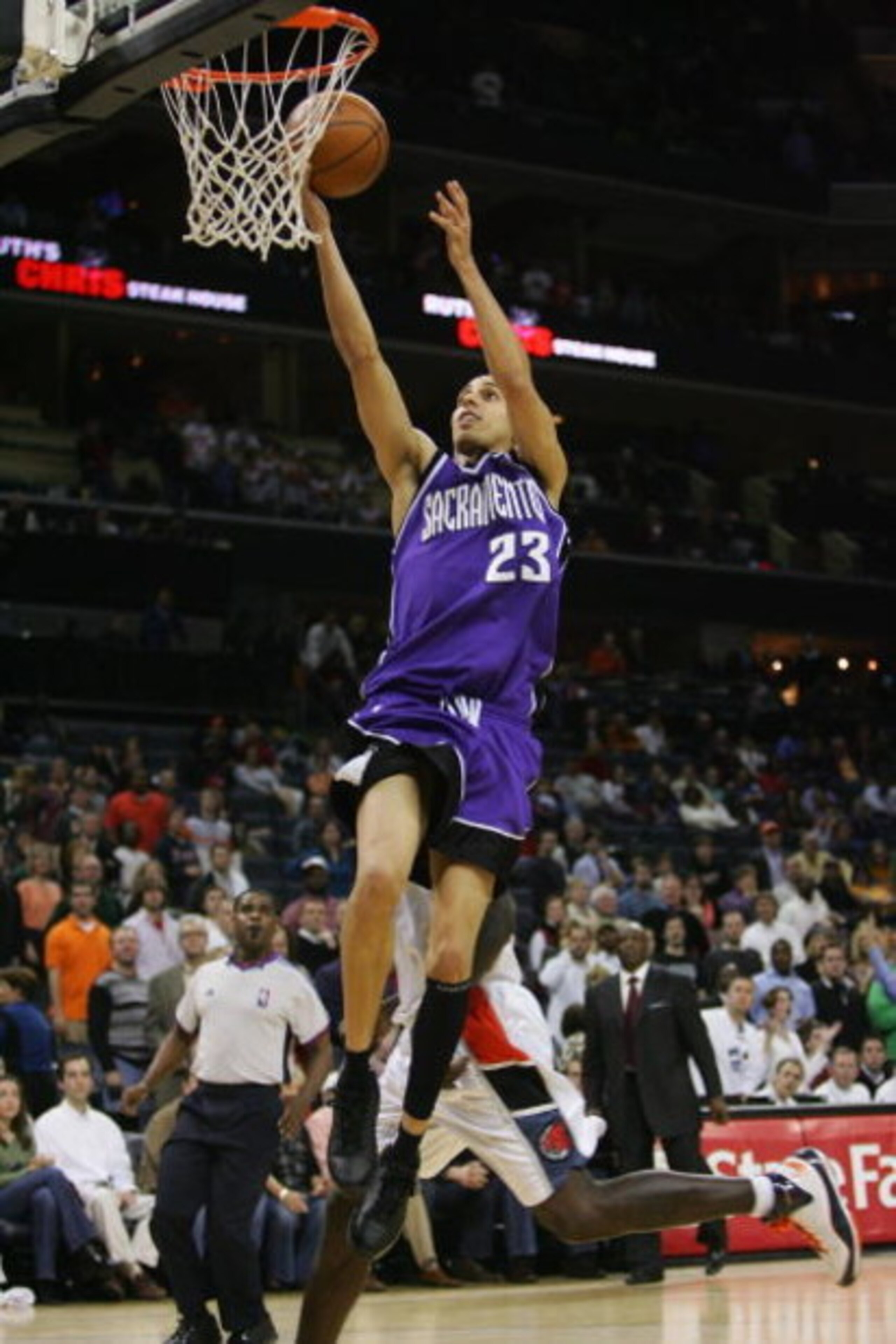 CHARLOTTE, NC - FEBRUARY 22: Kevin Martin #23 of the Sacramento Kings takes the ball to the basket against the Charlotte Bobcats during the game at Bobcats Arena on February 22, 2008 in Charlotte, North Carolina. The Kings won 116-115. NOTE TO USER: Use CHARLOTTE, NC - FEBRUARY 22: Kevin Martin #23 of the Sacramento Kings takes the ball to the basket against the Charlotte Bobcats during the game at Bobcats Arena on February 22, 2008 in Charlotte, North Carolina. The Kings won 116-115. NOTE TO USER: Use