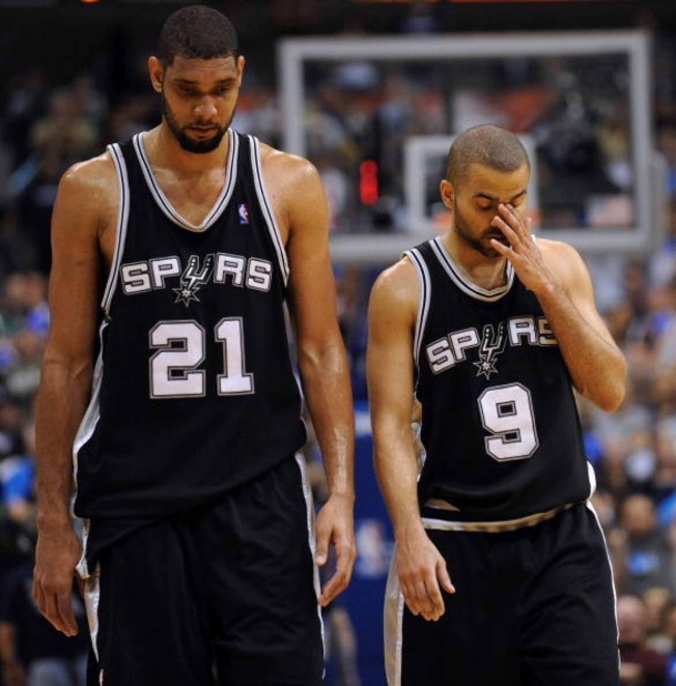 DALLAS - APRIL 25: Forward Tim Duncan #21 and Tony Parker #9 of the San Antonio Spurs during a 99-90 loss against the Dallas Mavericks in Game Four of the Western Conference Quarterfinals during the 2009 NBA Playoffs at American Airlines Center on April DALLAS - APRIL 25: Forward Tim Duncan #21 and Tony Parker #9 of the San Antonio Spurs during a 99-90 loss against the Dallas Mavericks in Game Four of the Western Conference Quarterfinals during the 2009 NBA Playoffs at American Airlines Center on April