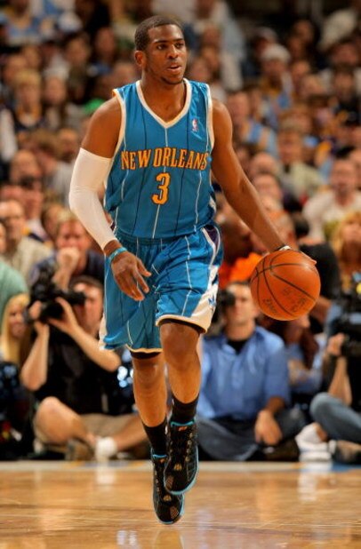 DENVER - APRIL 29:  Chris Paul #3 of the New Orleans Hornets brings the ball up court against the Denver Nuggets in Game Five of the Western Conference Quarterfinals during the 2009 NBA Playoffs at Pepsi Center on April 29, 2009 in Denver, Colorado. The N