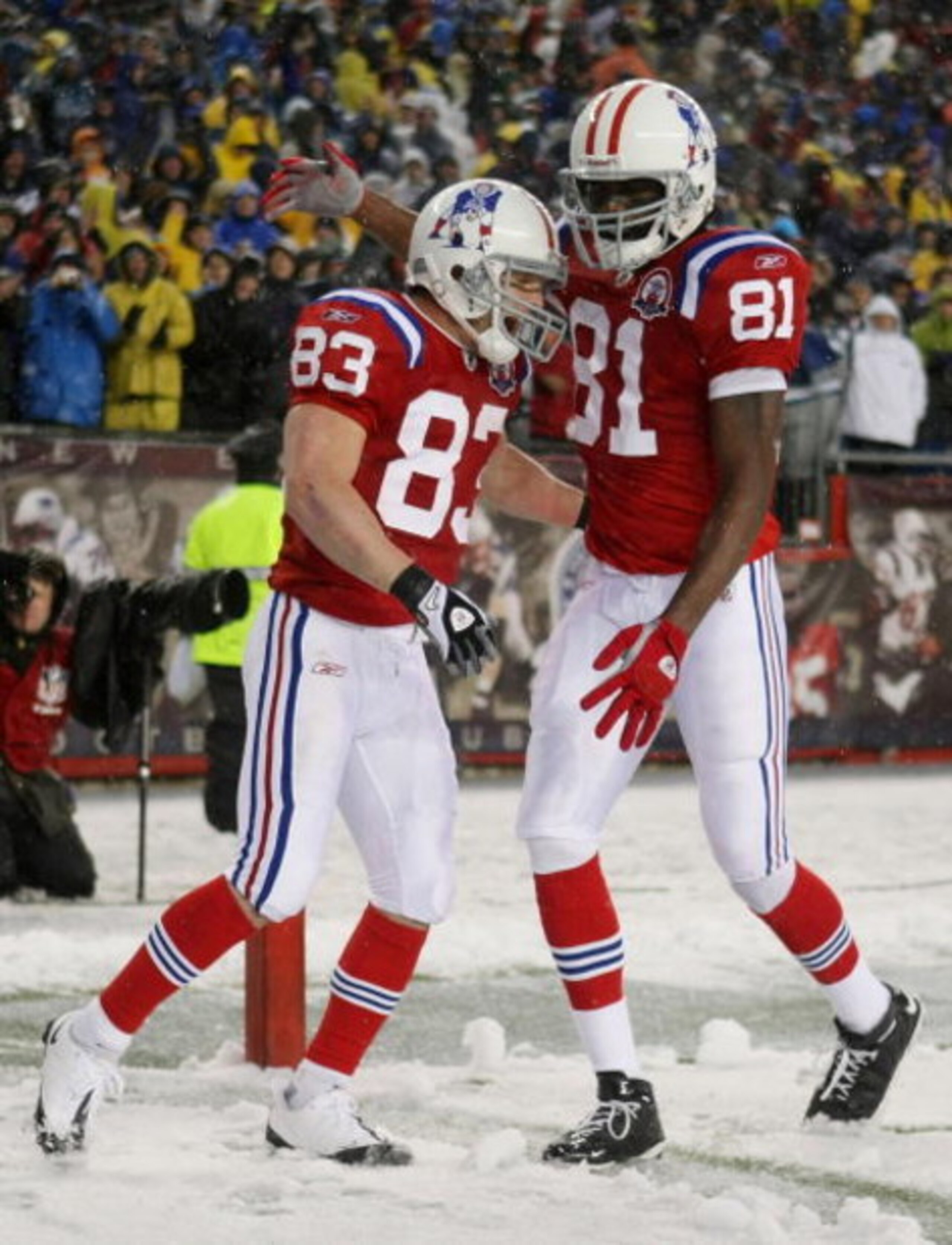 FOXBORO, MA - OCTOBER 18: Wes Welker #83 of the New England Patriots is congratulated by teammate Randy Moss #81 after Welker scored a touchdown in the second quarter against the Tennessee Titans on October 18, 2009 at Gillette Stadium in Foxboro, Massac FOXBORO, MA - OCTOBER 18: Wes Welker #83 of the New England Patriots is congratulated by teammate Randy Moss #81 after Welker scored a touchdown in the second quarter against the Tennessee Titans on October 18, 2009 at Gillette Stadium in Foxboro, Massac
