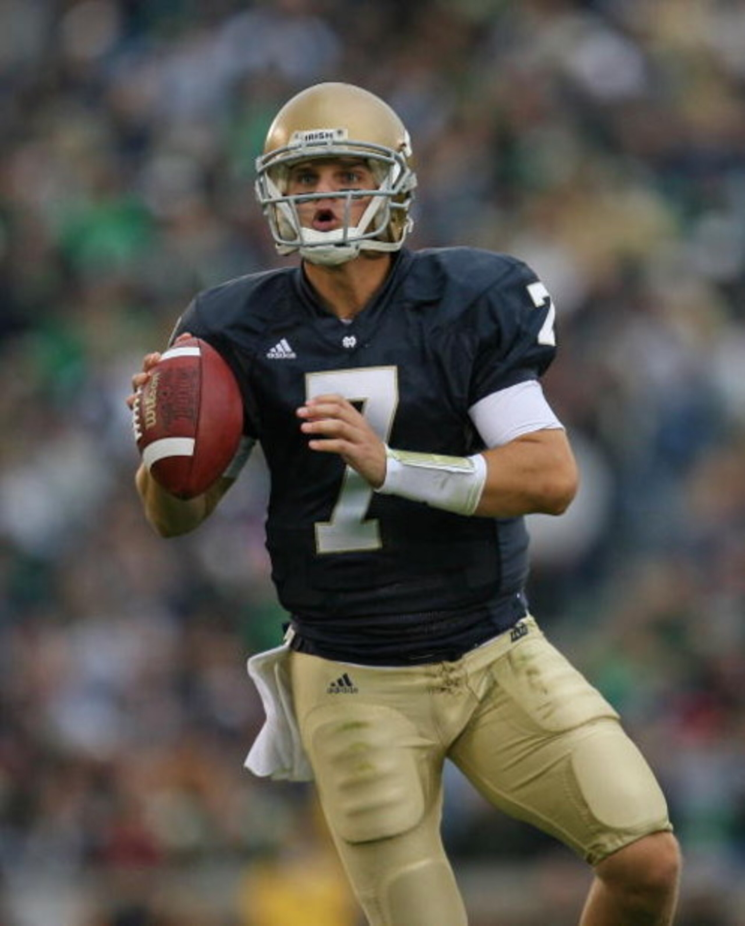 SOUTH BEND, IN - OCTOBER 03: Jimmy Clausen #7 of the Notre Dame Fighting Irish looks for a receiver against the Washington Huskies on October 3, 2009 at Notre Dame Stadium in South Bend, Indiana. Notre Dame defeated Washington 37-30 in overtime. (Photo by
