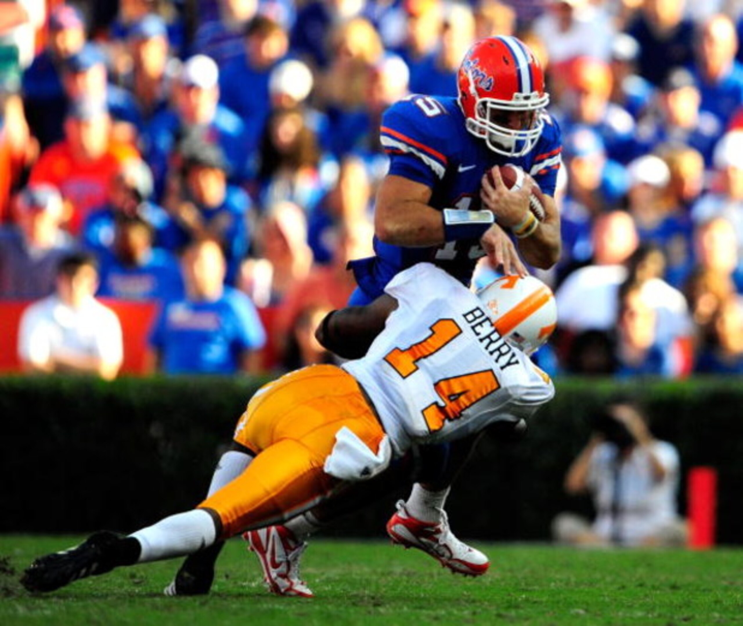 GAINESVILLE, FL - SEPTEMBER 19:  Tim Tebow #15 of the Florida Gators is tackled by Eric Berry #14 of the Tennessee Volunteers during the game at Ben Hill Griffin Stadium on September 19, 2009 in Gainesville, Florida.  (Photo by Sam Greenwood/Getty Images)