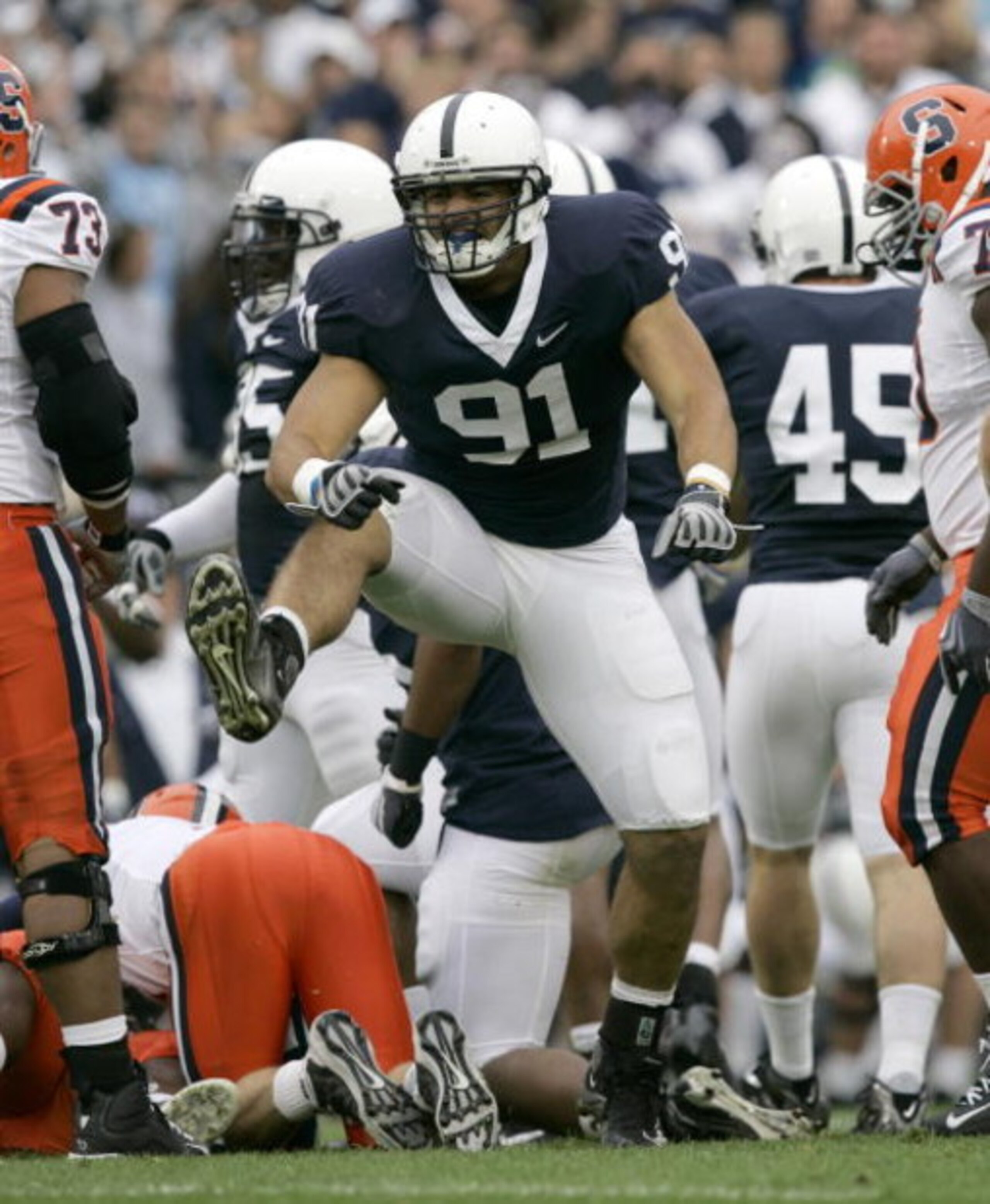 STATE COLLEGE, PA - SEPTEMBER 12: Tackle Jared Odrick #91of the Penn State Nittany Lions celebrates sacking quarterback Greg Paulus of the Syracuse Orangemen during the first half at Beaver Stadium  September 12, 2009 in State College, Pennsylvania. (Phot