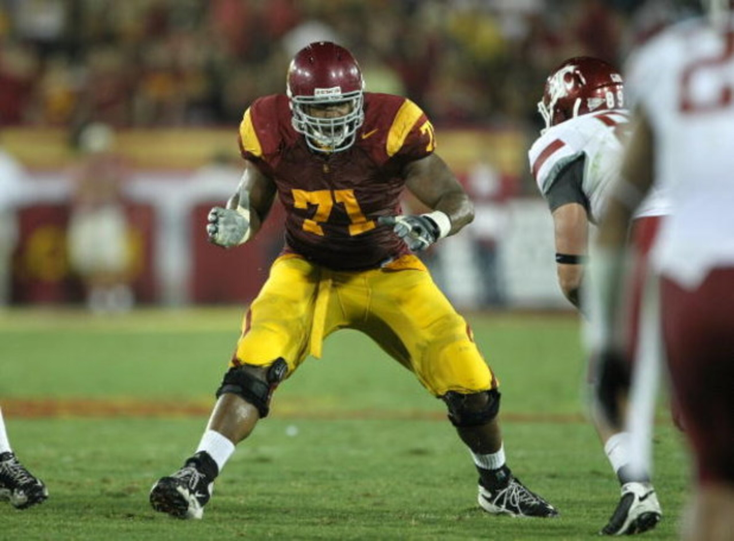 LOS ANGELES - SEPTEMBER 23:  Offensive tackle Charles Brown #71 of the USC Trojans blocks against the Washington State Cougars on September 23, 2009 at the Los Angeles Coliseum in Los Angeles, California.  USC won 27-6.   (Photo by Stephen Dunn/Getty Imag