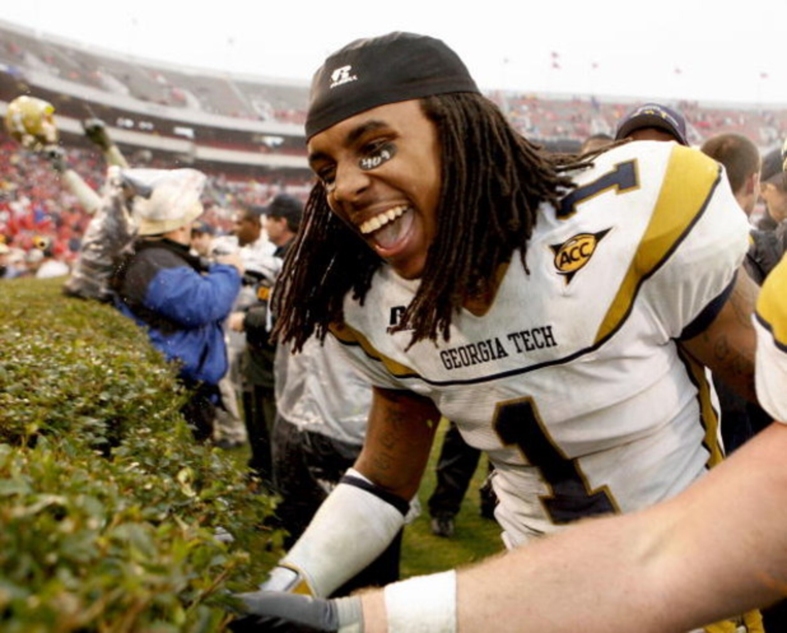 ATHENS, GA - NOVEMBER 29:  Safety Morgan Burnett #1 of the Georgia Tech Yellow Jackets celebrates near the Sanford Stadium hedges after the game against the Georgia Bulldogs at Sanford Stadium on November 29, 2008 in Athens, Georgia.  The Yellow Jackets b