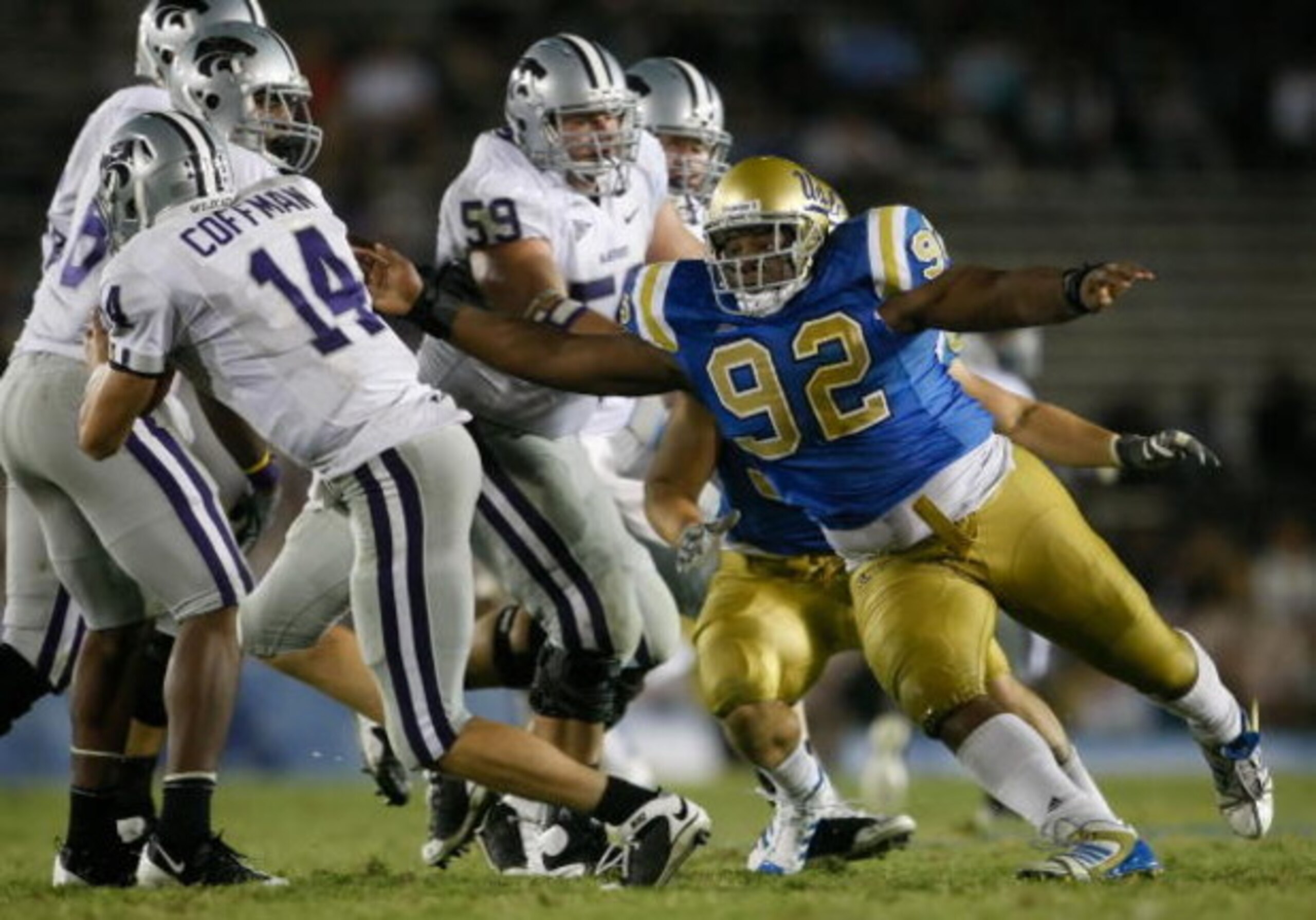 PASADENA, CA - SEPTEMBER 19:  Brian Price #92 of the UCLA Bruins hurries quarterback Carson Coffman #14 of the Kansas State Wildcats in the fourth quarter at the Rose Bowl on September 19, 2009 in Pasadena, California. UCLA defeated Kansas State 23-9.  (P