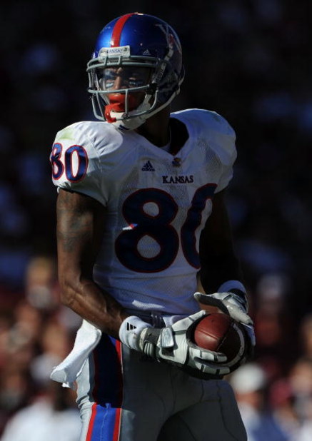 NORMAN, OK - OCTOBER 18:  Wide receiver Dezmon Briscoe #80 of the Kansas Jayhawks during play against the Oklahoma Sooners at Memorial Stadium on October 18, 2008 in Norman, Oklahoma.  (Photo by Ronald Martinez/Getty Images)