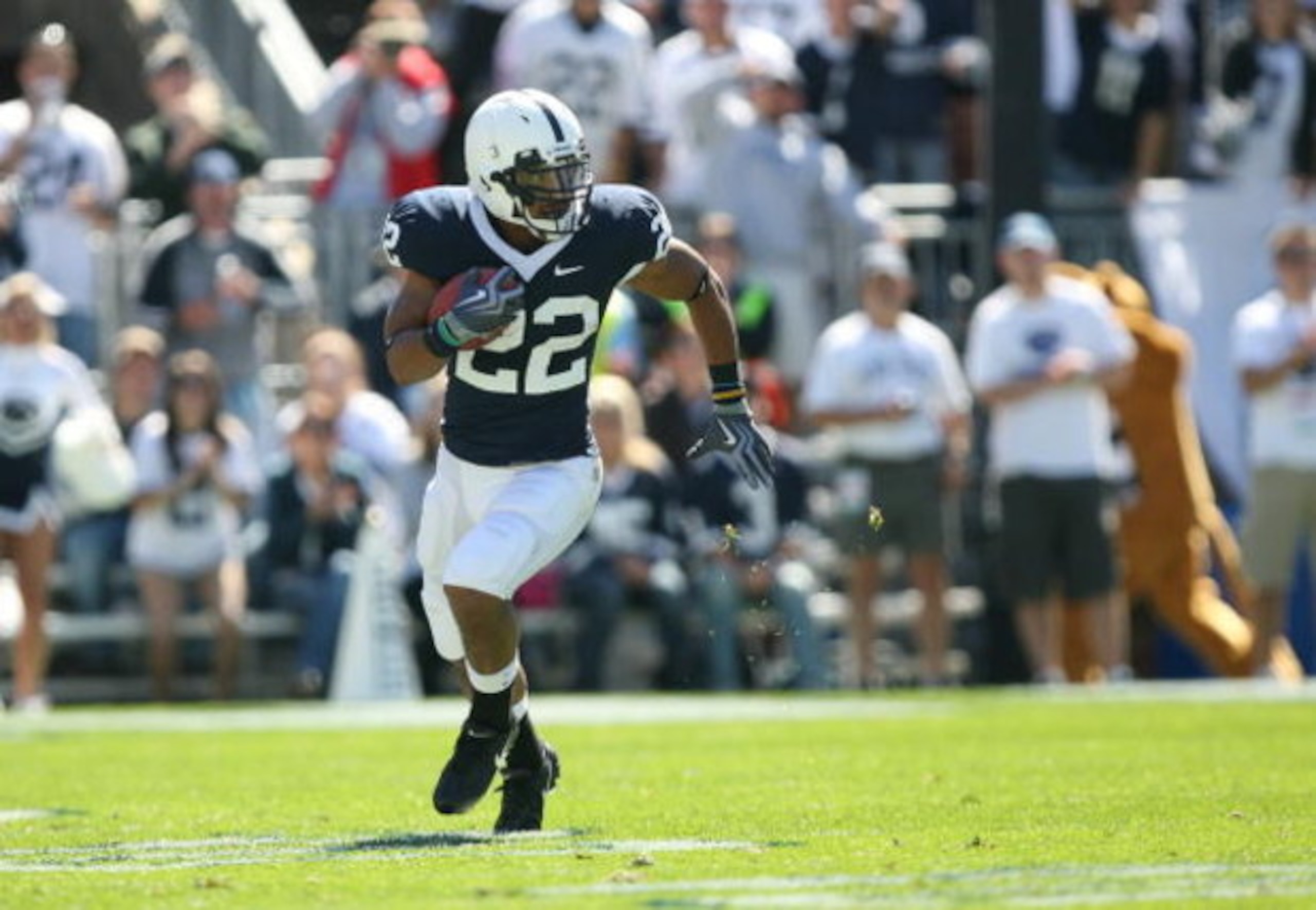 STATE COLLEGE, PA - SEPTEMBER 19: Running back Evan Royster #22 of the Penn State Nittany Lions carries the ball during a game against the Temple Owls on September 19, 2009 at Beaver Stadium in State College, Pennsylvania. (Photo by Hunter Martin/Getty Im STATE COLLEGE, PA - SEPTEMBER 19: Running back Evan Royster #22 of the Penn State Nittany Lions carries the ball during a game against the Temple Owls on September 19, 2009 at Beaver Stadium in State College, Pennsylvania. (Photo by Hunter Martin/Getty Im