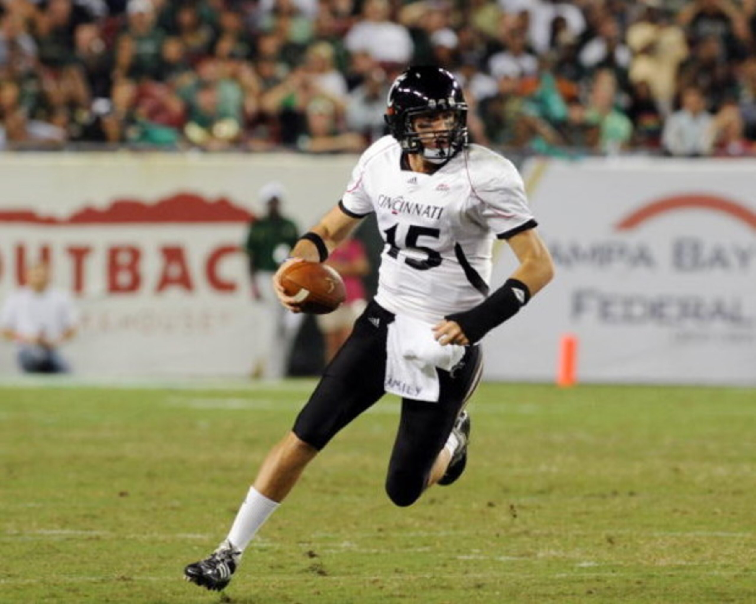 TAMPA, FL - OCTOBER 15: Quarterback Tony Pike #15 of the Cincinnati Bearcats rushes up field against the University of South Florida Bulls October 15, 2009 at Raymond James Stadium in Tampa, Florida. (Photo by Al Messerschmidt/Getty Images) TAMPA, FL - OCTOBER 15: Quarterback Tony Pike #15 of the Cincinnati Bearcats rushes up field against the University of South Florida Bulls October 15, 2009 at Raymond James Stadium in Tampa, Florida. (Photo by Al Messerschmidt/Getty Images)