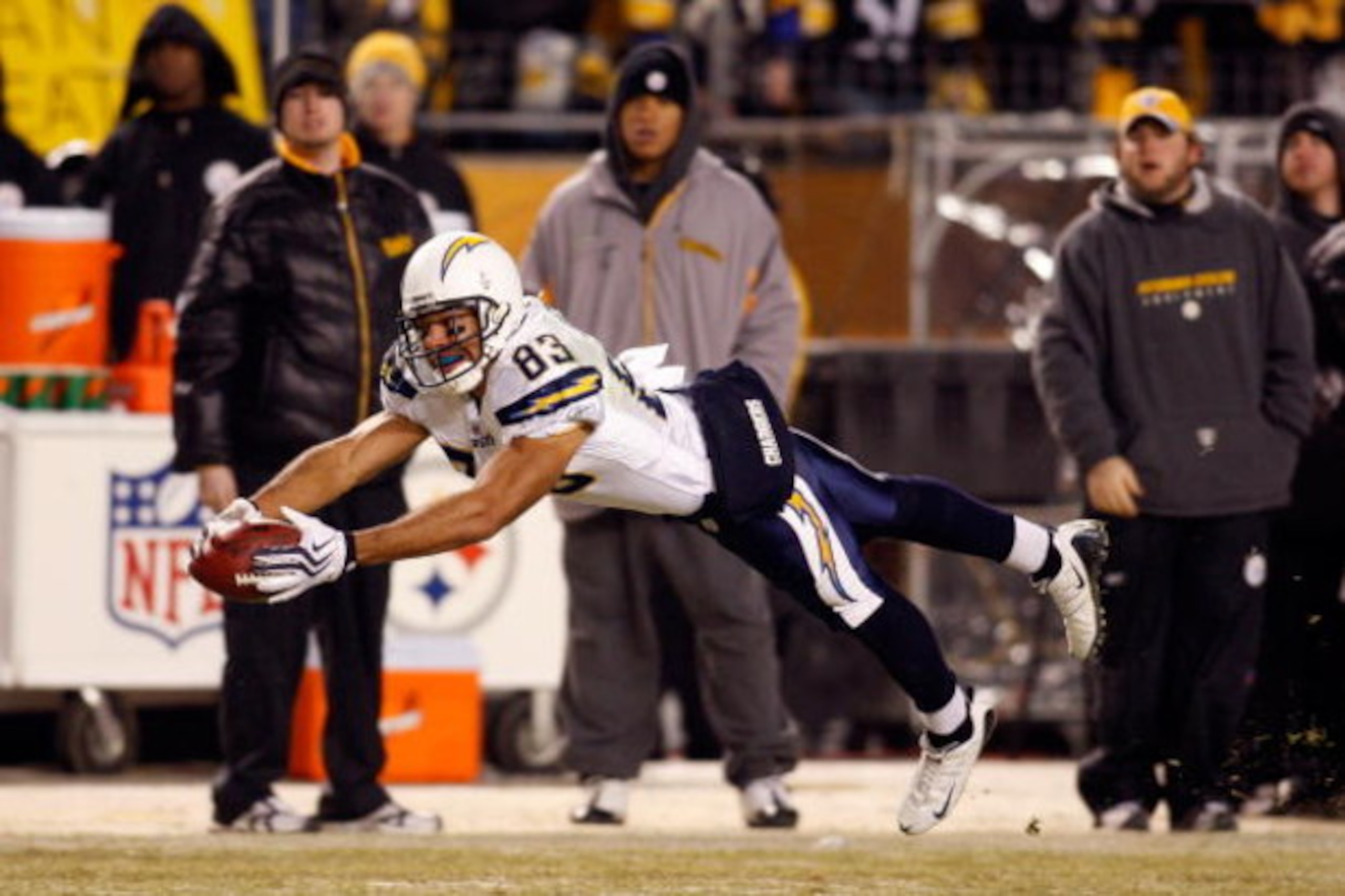 PITTSBURGH - JANUARY 11:  Vincent Jackson #83 of  the San Diego Chargers attempts to make a play on a pass that was originally called a reception but was over turned on a coaches challenge against the Pittsburgh Steelers during their AFC Divisional Playof