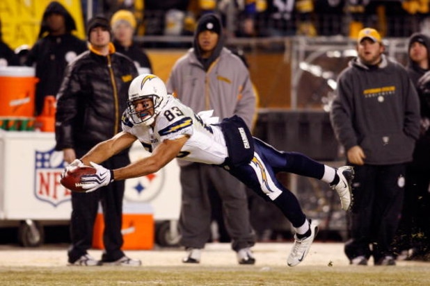 PITTSBURGH - JANUARY 11:  Vincent Jackson #83 of  the San Diego Chargers attempts to make a play on a pass that was originally called a reception but was over turned on a coaches challenge against the Pittsburgh Steelers during their AFC Divisional Playof