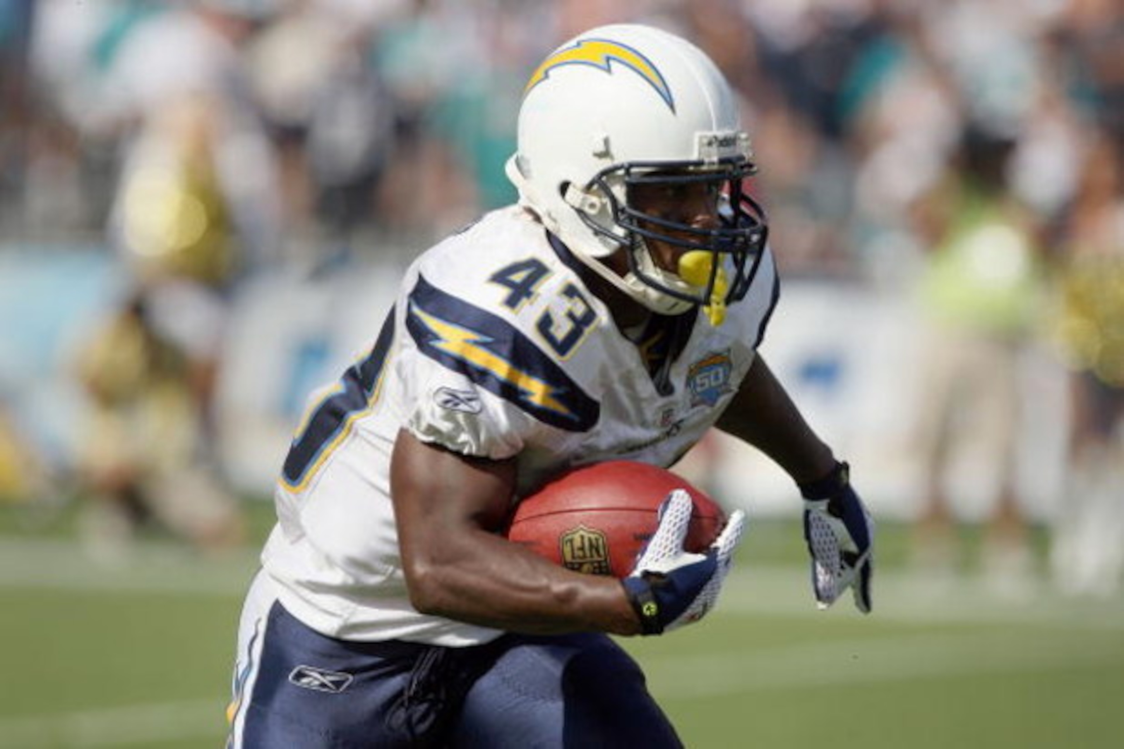 SAN DIEGO, CA - SEPTEMBER 27:  Running back Darren Sproles #43 of the San Diego Chargers runs with the ball against the Miami Dolphins at Qualcomm Stadium on September 27, 2009 in San Diego, California. (Photo by Donald Miralle/Getty Images)