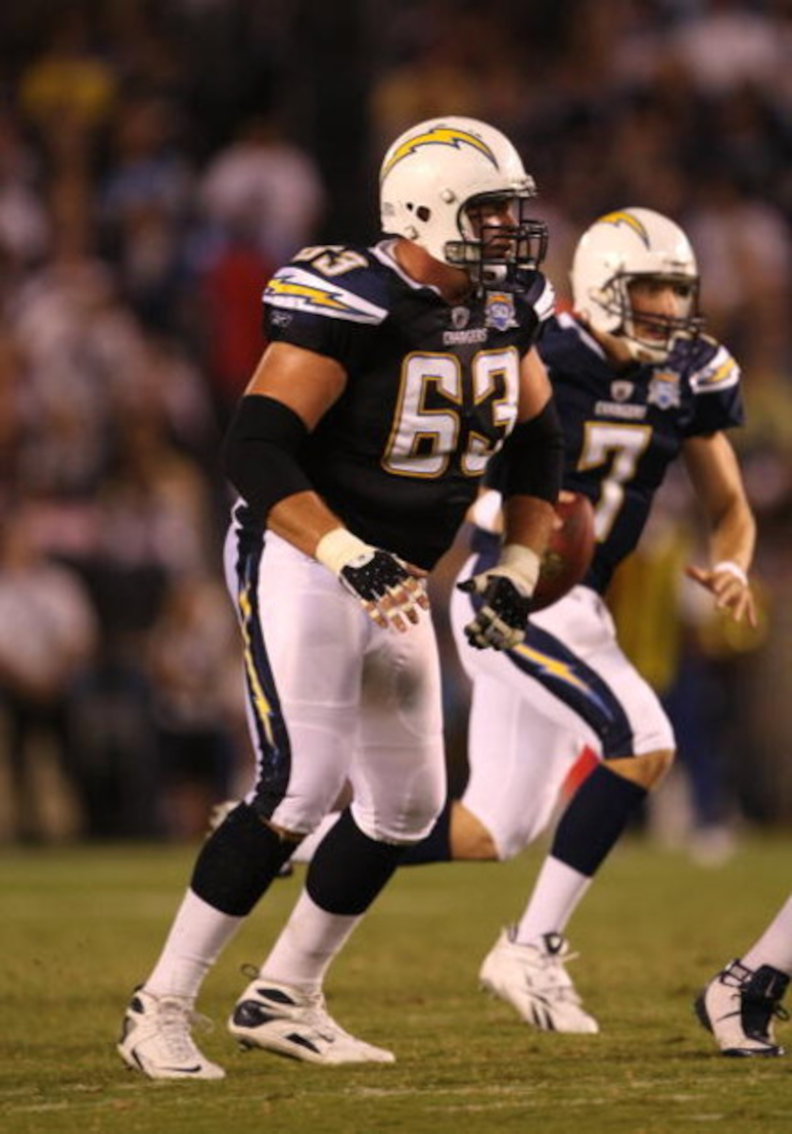 SAN DIEGO - AUGUST 15: Center Scott Mruczkowski #63 of  the San Diego Chargers blocks against the Seattle Seahawks on August 15, 2009 at Qualcomm Stadium in San Diego, California.    (Photo by Stephen Dunn/Getty Images)