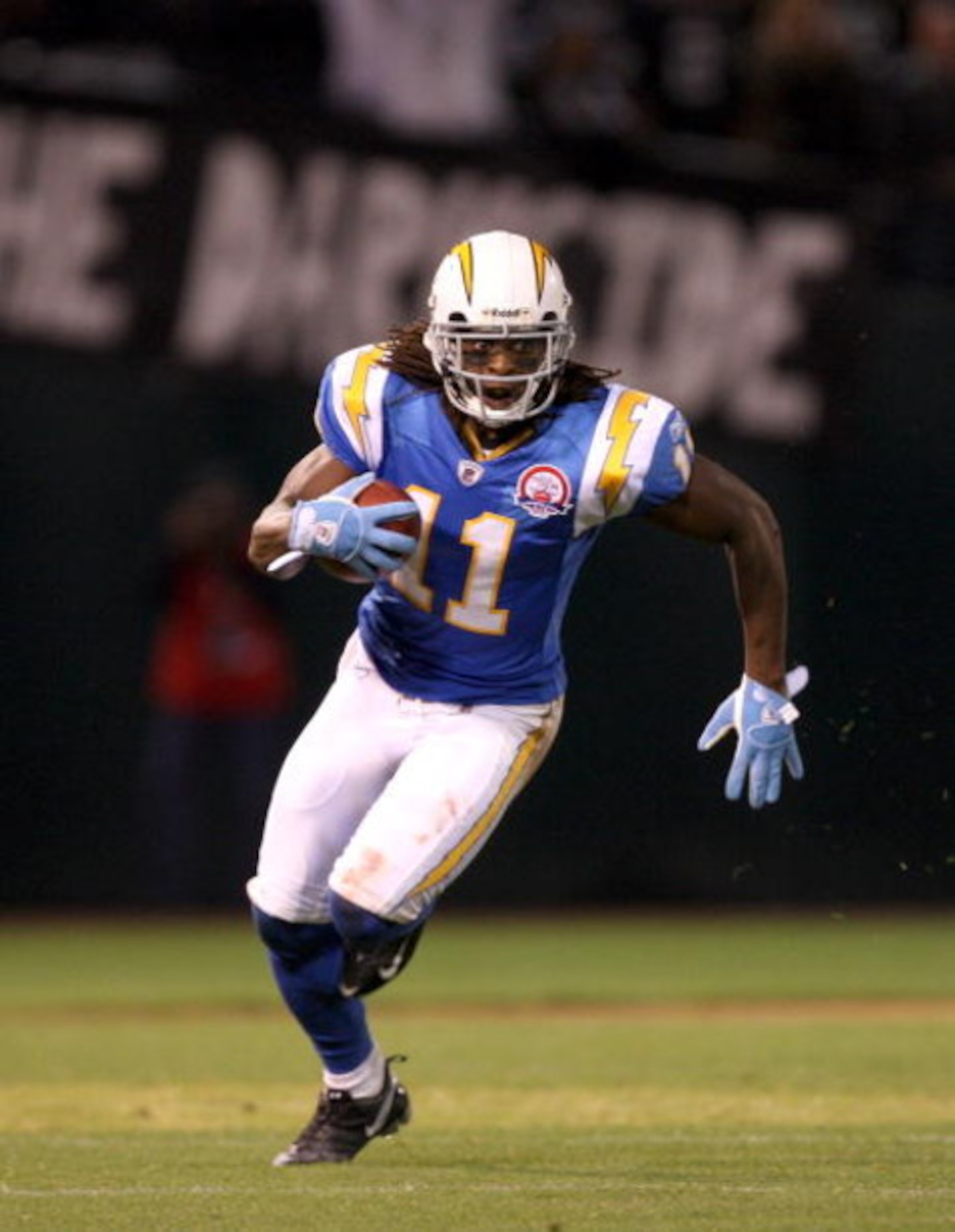 OAKLAND, CA - SEPTEMBER 14:  Legedu Naanee #11 of the San Diego Chargers runs with the ball during their game against the Oakland Raiders on September 14, 2009 at the Oakland-Alameda County Coliseum in Oakland, California.  (Photo by Ezra Shaw/Getty Image