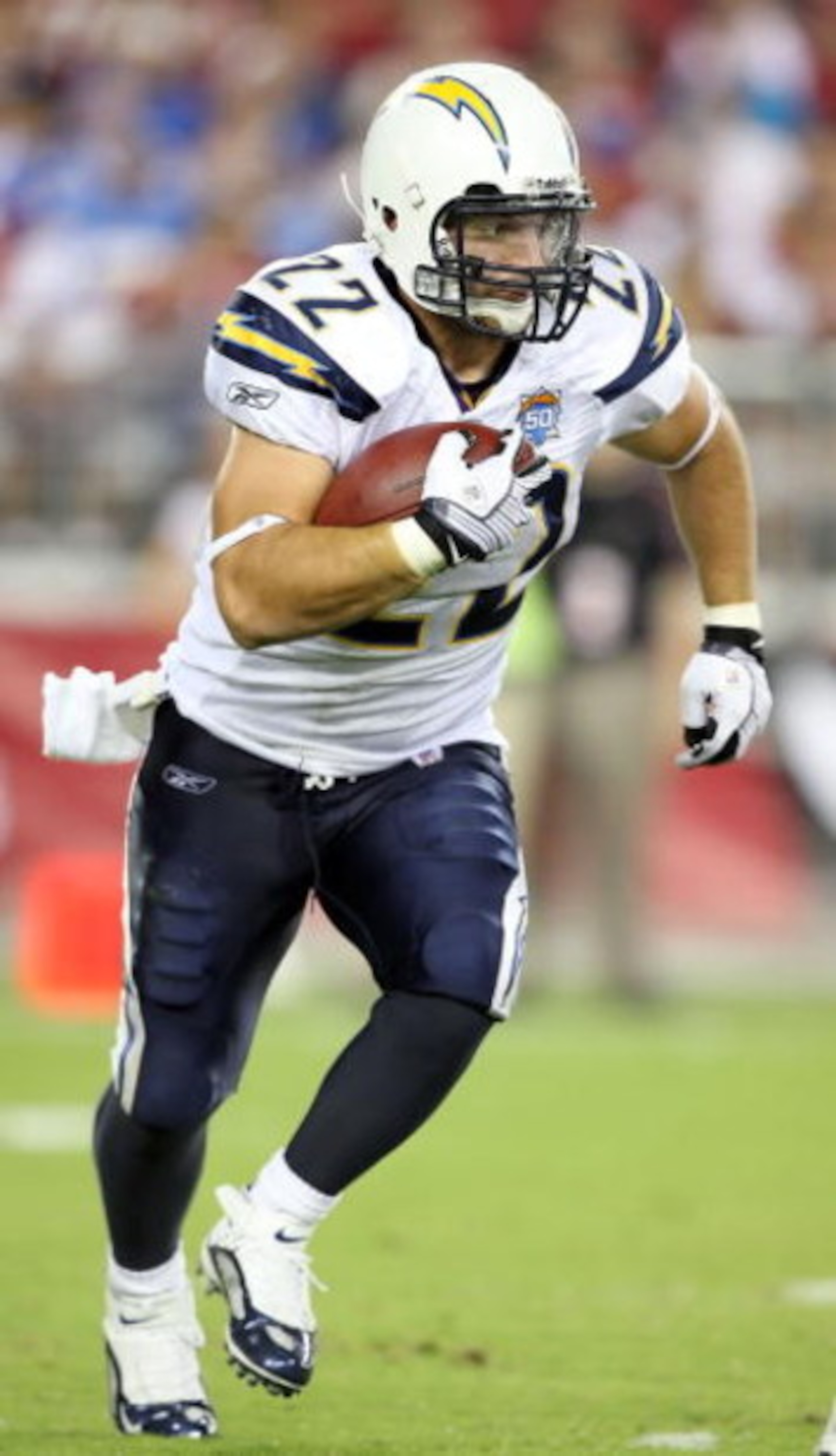 GLENDALE, AZ - AUGUST 22:  Runningback Jacob Hester #22 of the San Diego Chargers rushes the football during the preseason NFL game against the Arizona Cardinals at the Universtity of Phoenix Stadium on August 22, 2009 in Glendale, Arizona.  The Chargers 