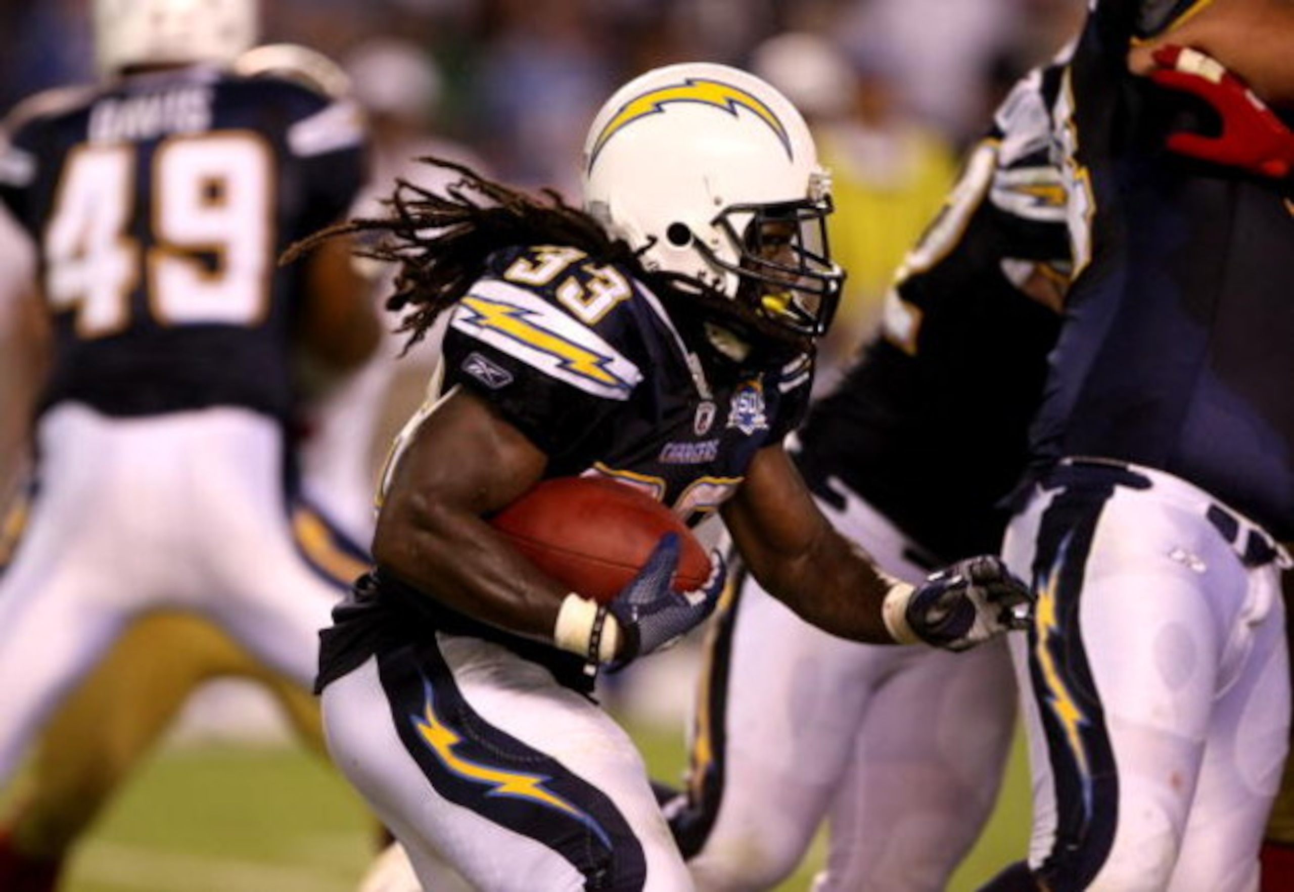 SAN DIEGO - SEPTEMBER 04:  Running back Gartrell Johnson #33 of the San Diego Chargers carries the ball against the San Francisco 49ers on September 4, 2009 at Qualcomm Stadium in San Diego, California.  The Chargers won 26-7. (Photo by Stephen Dunn/Getty