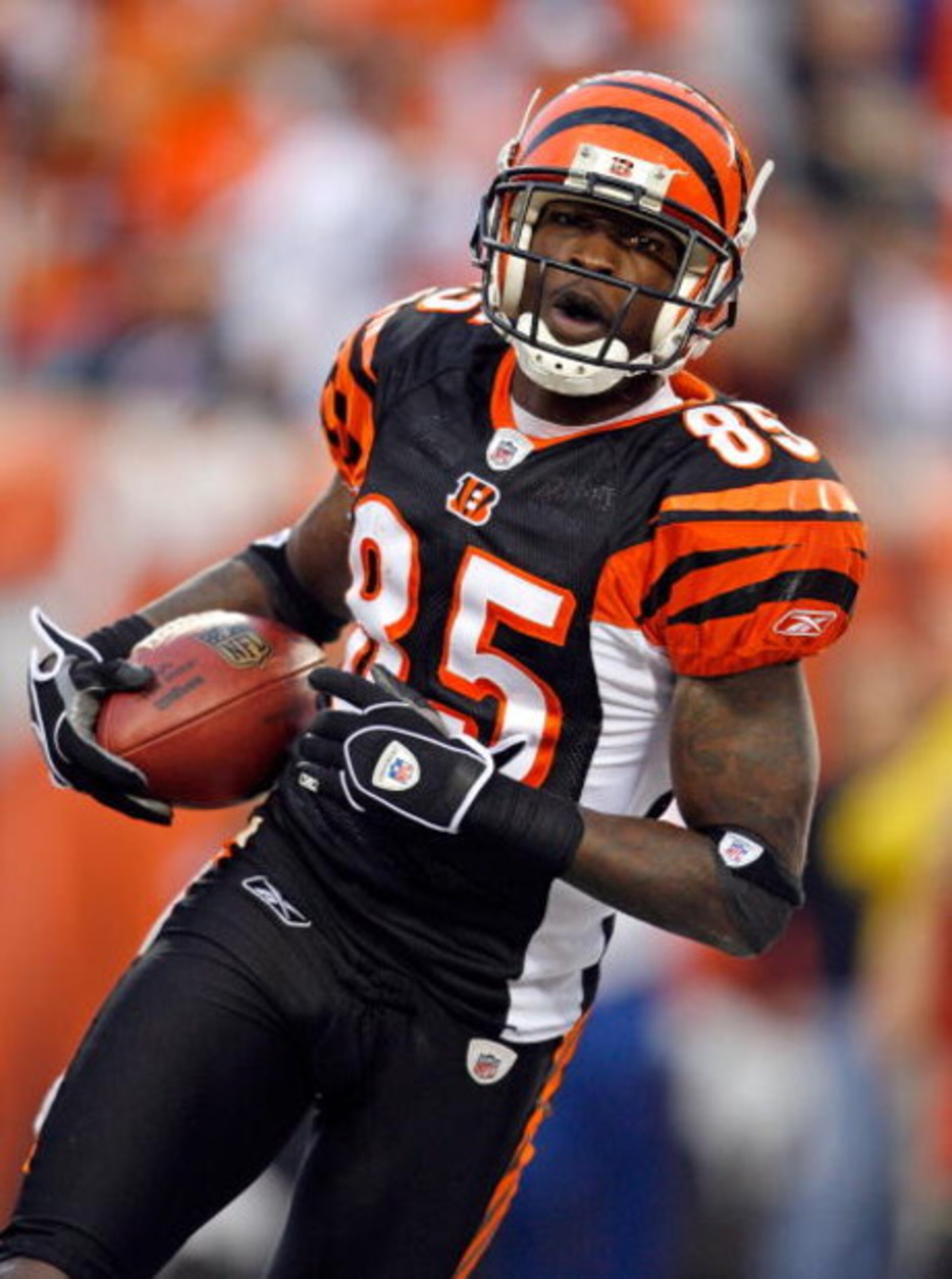 CINCINNATI - OCTOBER 25:  Chad Ochocinco #85 of the Cincinnati Bengals scores a touchdown during the NFL game against the Chicago Bears at Paul Brown Stadium on October 25, 2009 in Cincinnati, Ohio.  The Bengals won 45-10.  (Photo by Andy Lyons/Getty Imag