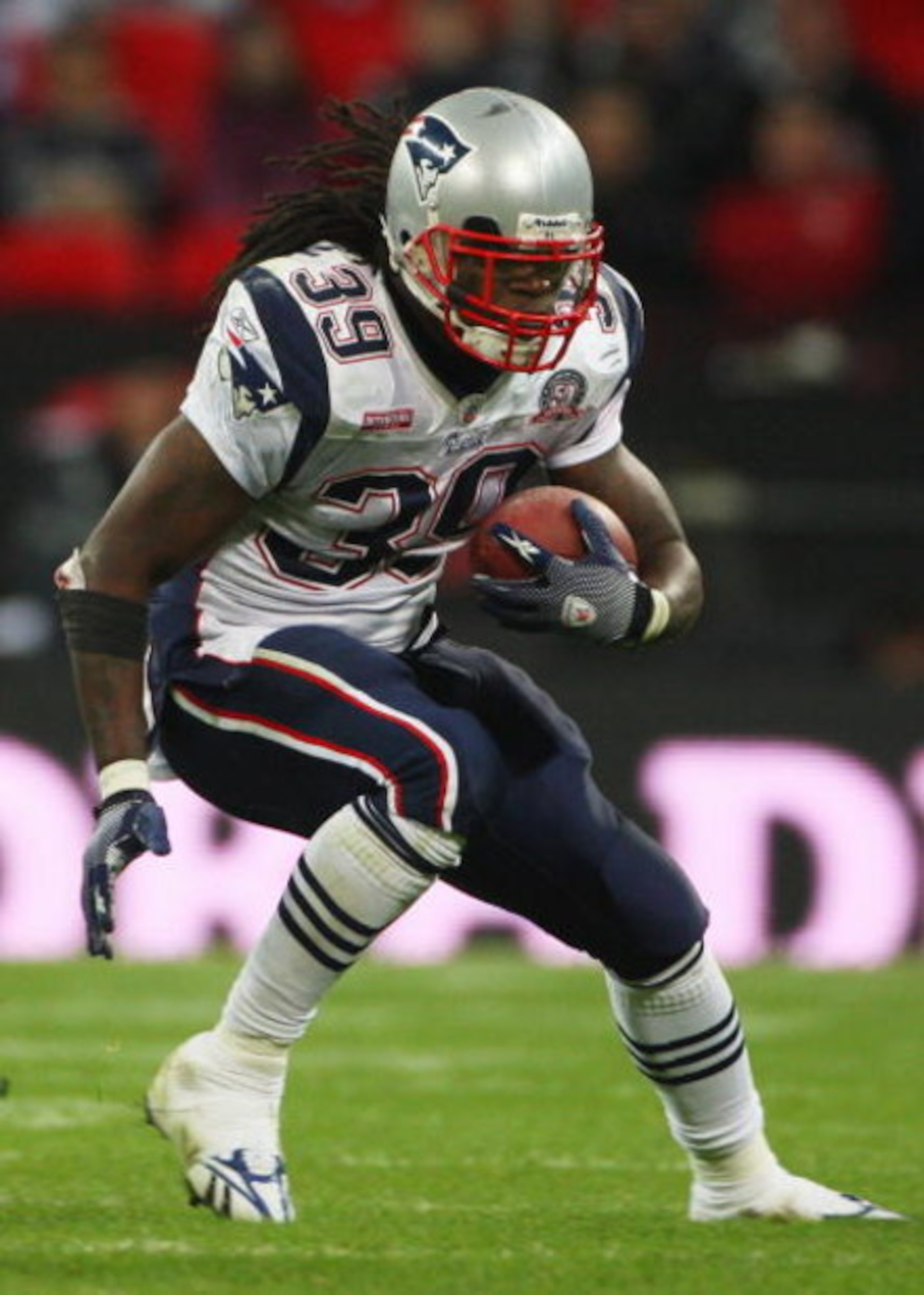 LONDON, ENGLAND - OCTOBER 25:  Laurence Maroney (#39) of the New England Patriots runs with the ball during the NFL International Series match between New England Patriots and Tampa Bay Buccaneers at Wembley Stadium on October 25, 2009 in London, England.
