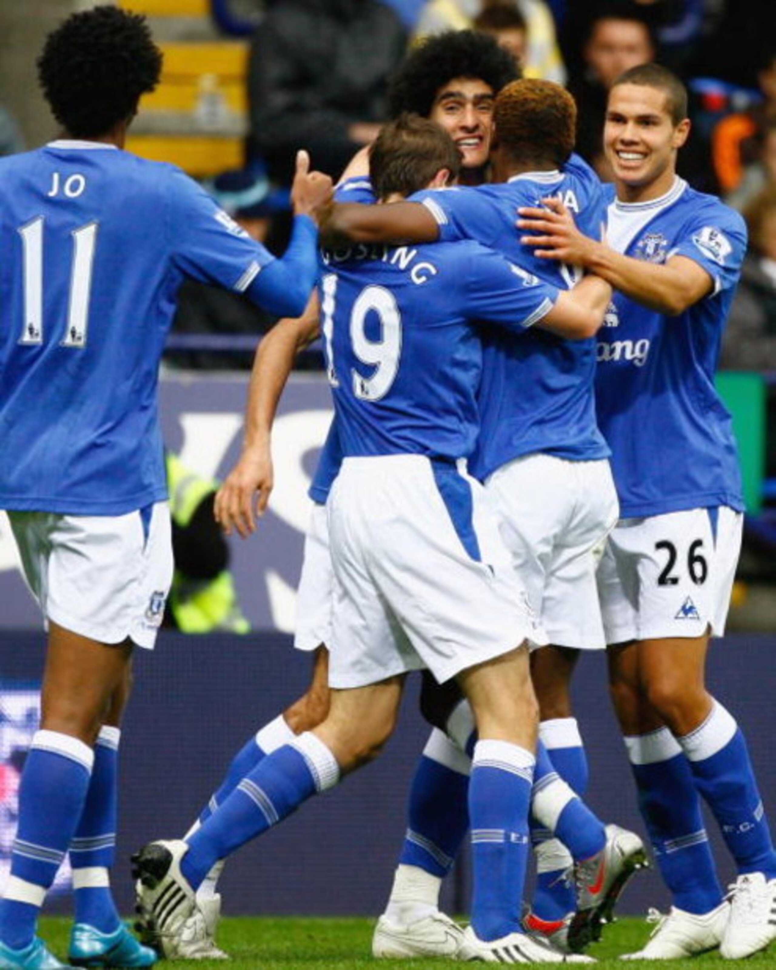 BOLTON, ENGLAND - OCTOBER 25: Marouane Fellaini of Everton is surrounded by team mates after scoring during the Barclays Premier League match between Bolton Wanderers and Everton at Reebok Stadium on October 25, 2009 in Bolton, England.  (Photo by Jeff J 