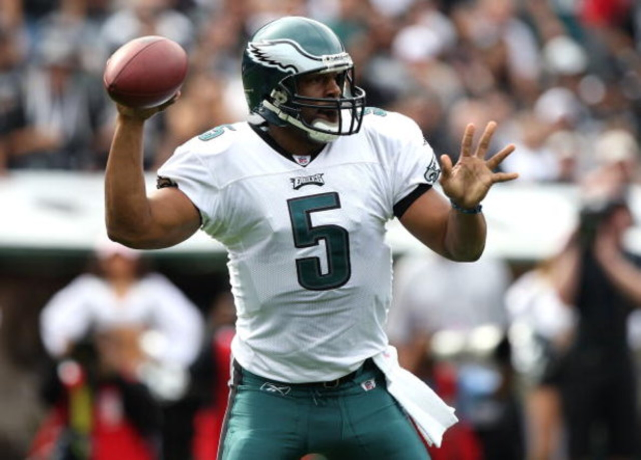 OAKLAND, CA - OCTOBER 18:  Donovan McNabb #5 of the Philadelphia Eagles passes against the Oakland Raiders during an NFL game at the Oakland-Alameda County Coliseum on October 18, 2009 in Oakland, California.  (Photo by Jed Jacobsohn/Getty Images)