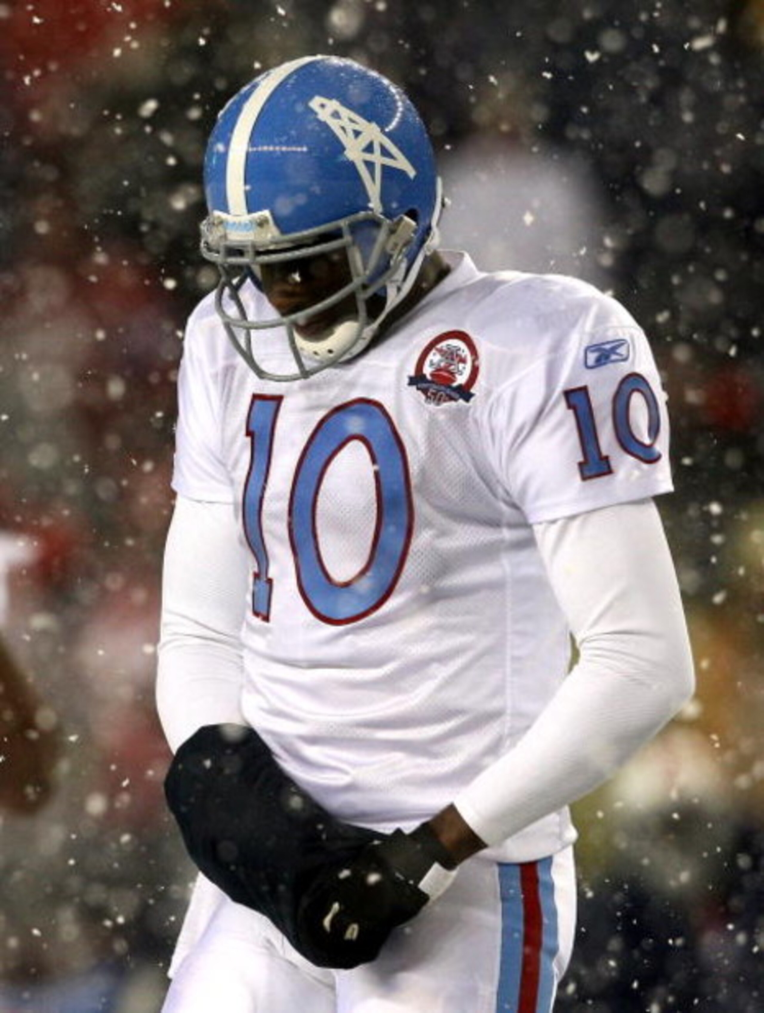 FOXBORO - OCTOBER 18:  Vince Young #10 of the Tennessee Titans  leaves the field in the fourth quarter during a game against the New England Patriots converse at Gillette Stadium on October 18, 2009 in Foxboro, Massachusetts. The Patriots won 59-0. (Photo
