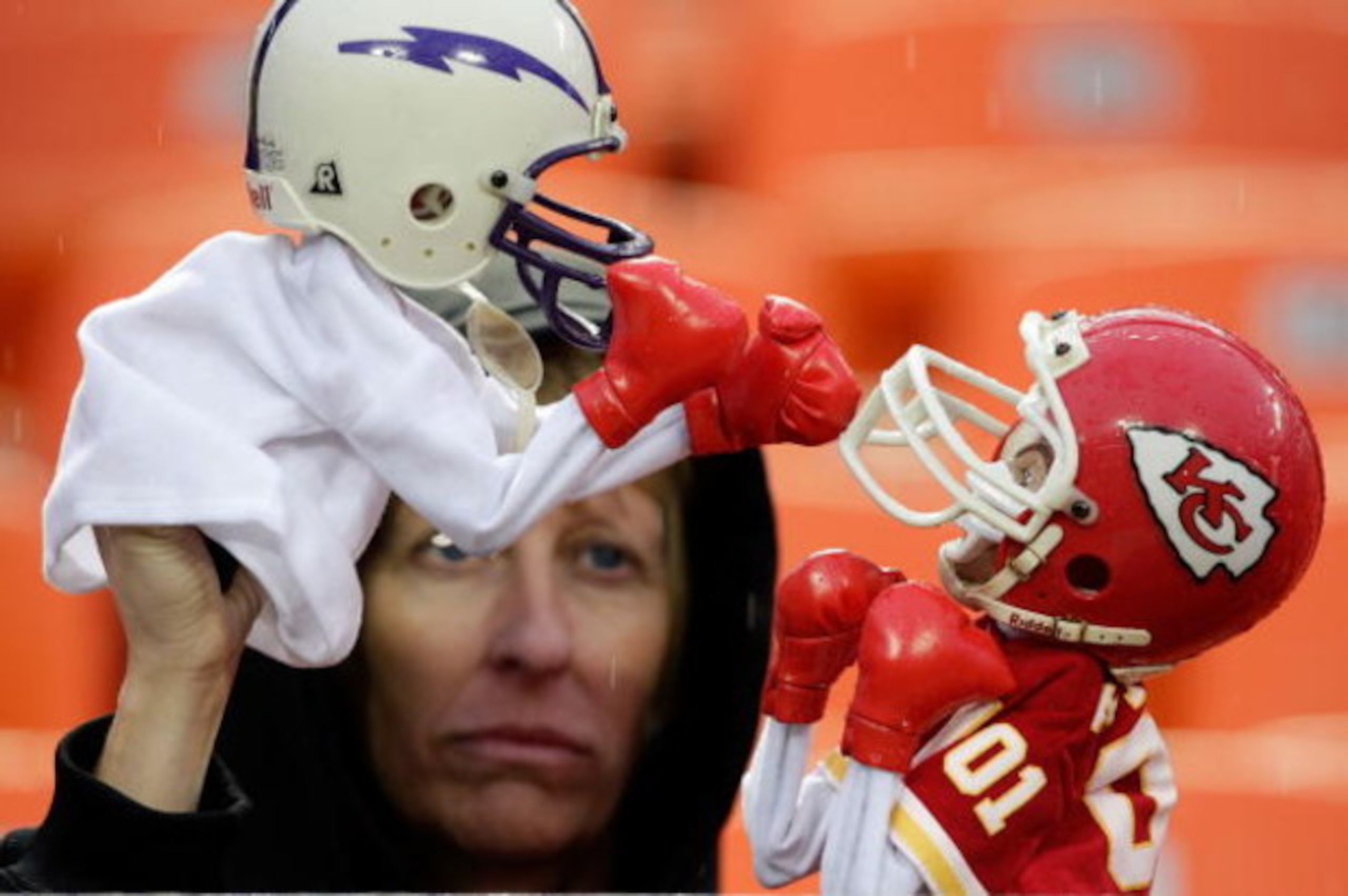 KANSAS CITY, MO - OCTOBER 25:  A wet Kansas City Chiefs fans plays with puppets in the rain during the game between the San Diego Chargers and the Kansas City Chiefs on October 25, 2009 at Arrowhead Stadium in Kansas City, Missouri.  (Photo by Jamie Squir