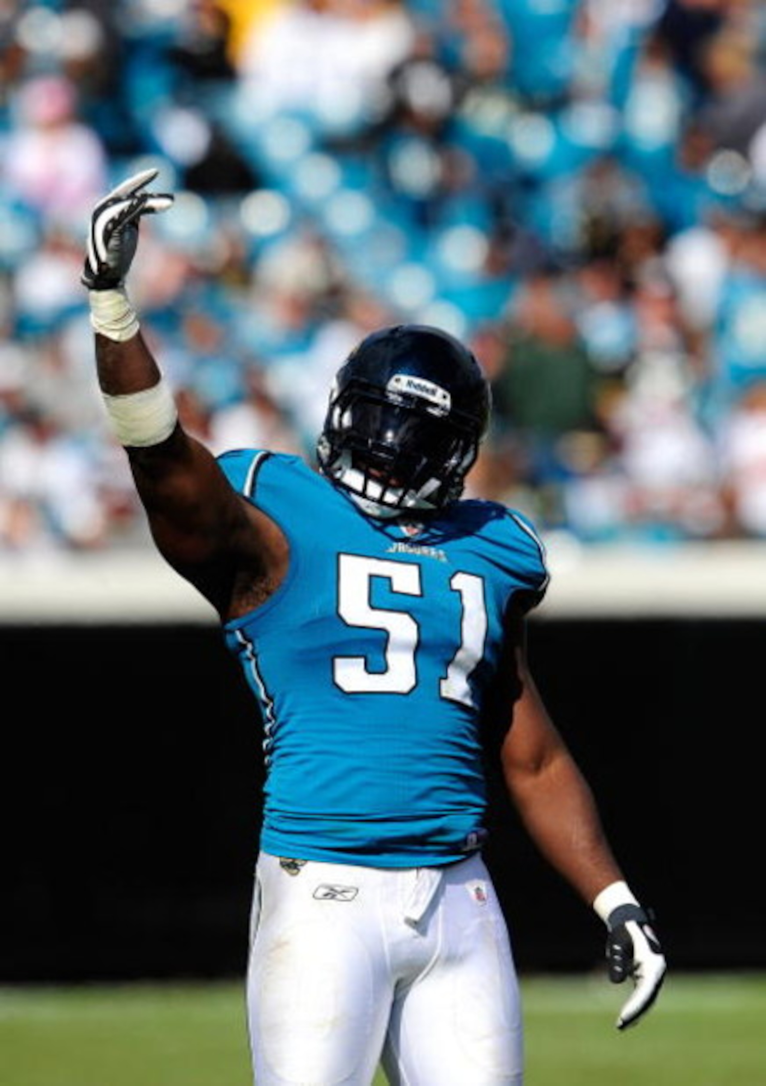 JACKSONVILLE, FL - OCTOBER 18:  Clint Ingram #51 of the Jacksonville Jaguars asks the crowd for noise during the game against the St. Louis Rams  at Jacksonville Municipal Stadium on October 18, 2009 in Jacksonville, Florida.  (Photo by Sam Greenwood/Gett