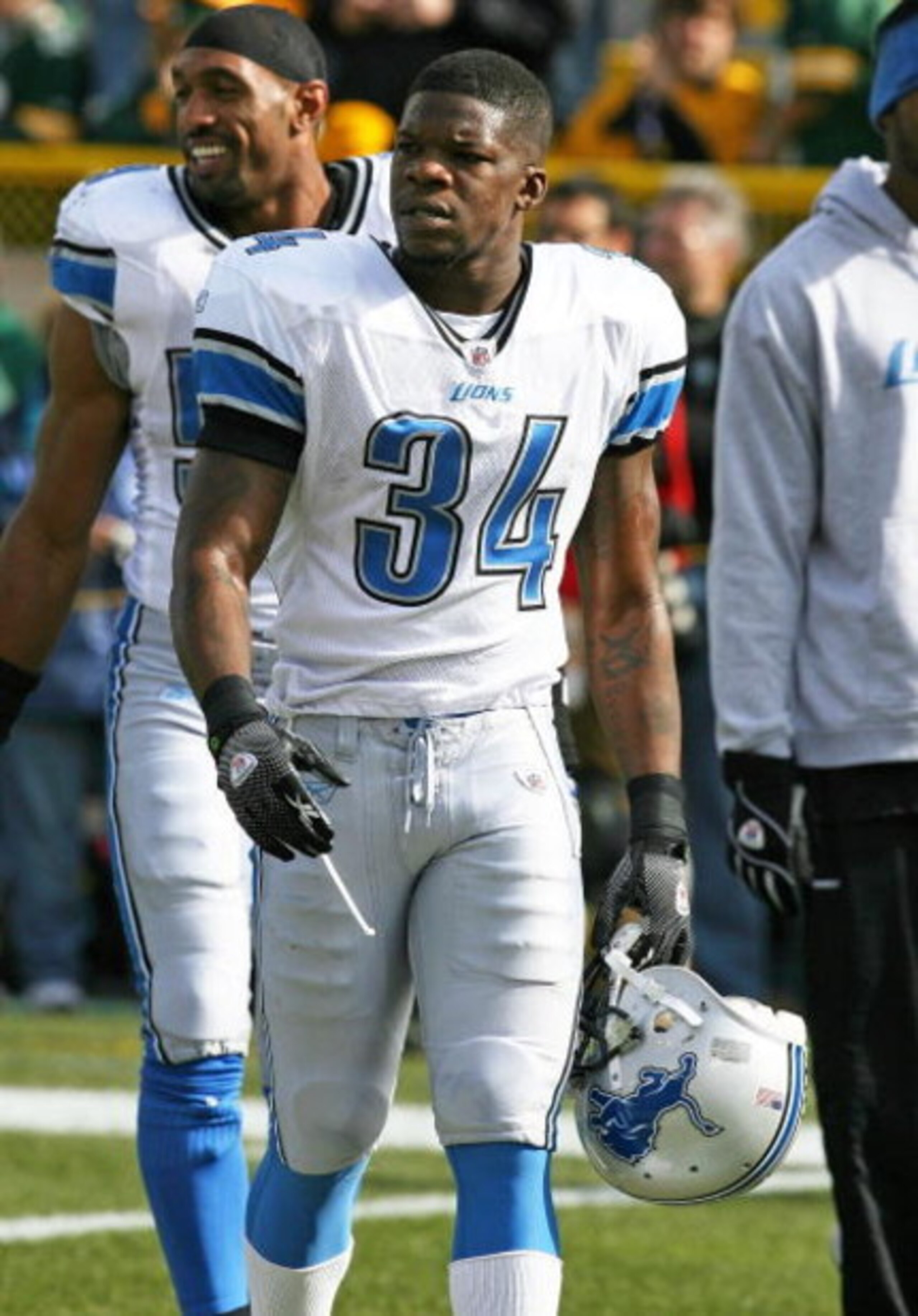 GREEN BAY, WI - OCTOBER 18: Kevin Smith #34 of the Detroit Lions participates in warm-ups before a game against the Green Bay Packers at Lambeau Field on October 18, 2009 in Green Bay, Wisconsin. The Packers defeated the Lions 26-0. (Photo by Jonathan Dan