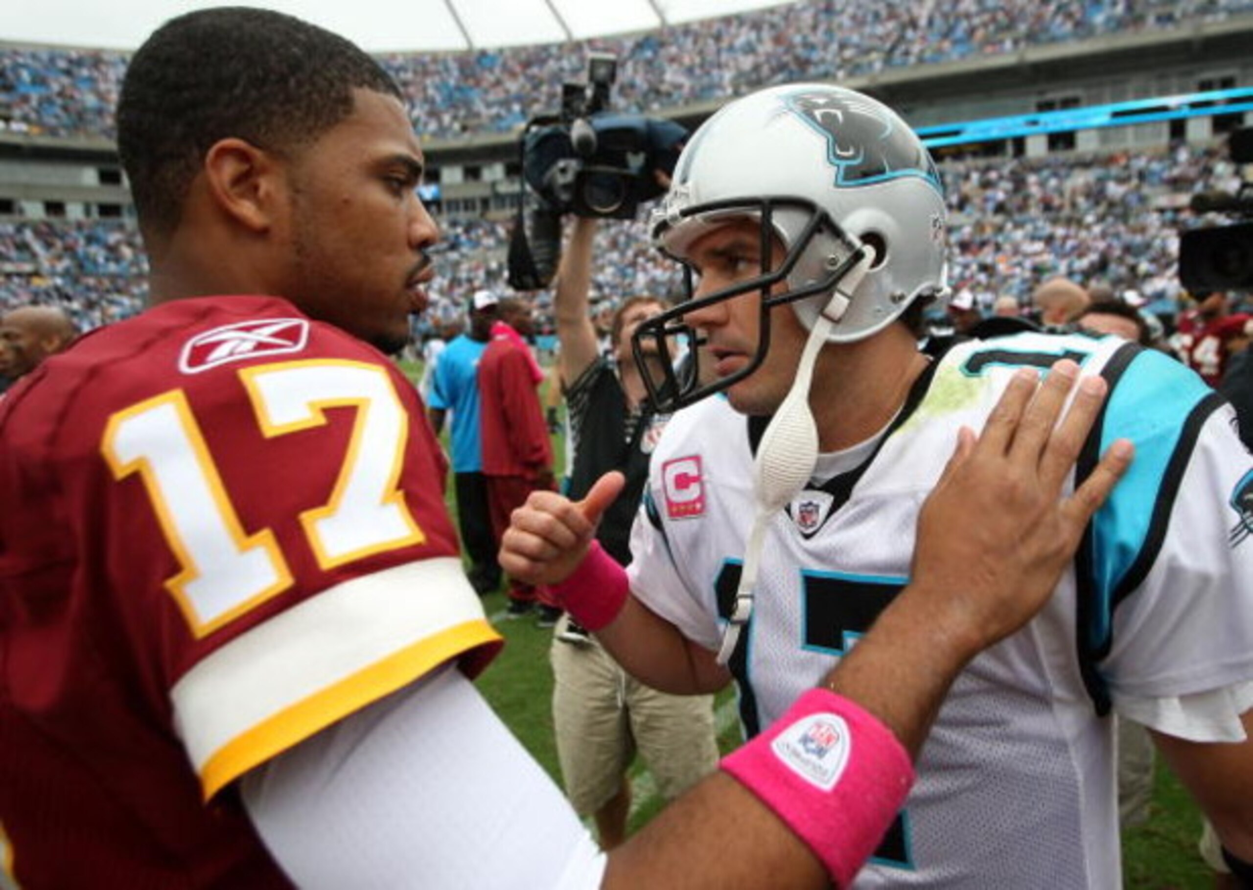 CHARLOTTE, NC - OCTOBER 11:  Jason Campbell #17 of Washington Redskins talks to Jake Delhomme #17 of the Carolina Panthers after their game at Bank of America Stadium on October 11, 2009 in Charlotte, North Carolina.  (Photo by Streeter Lecka/Getty Images