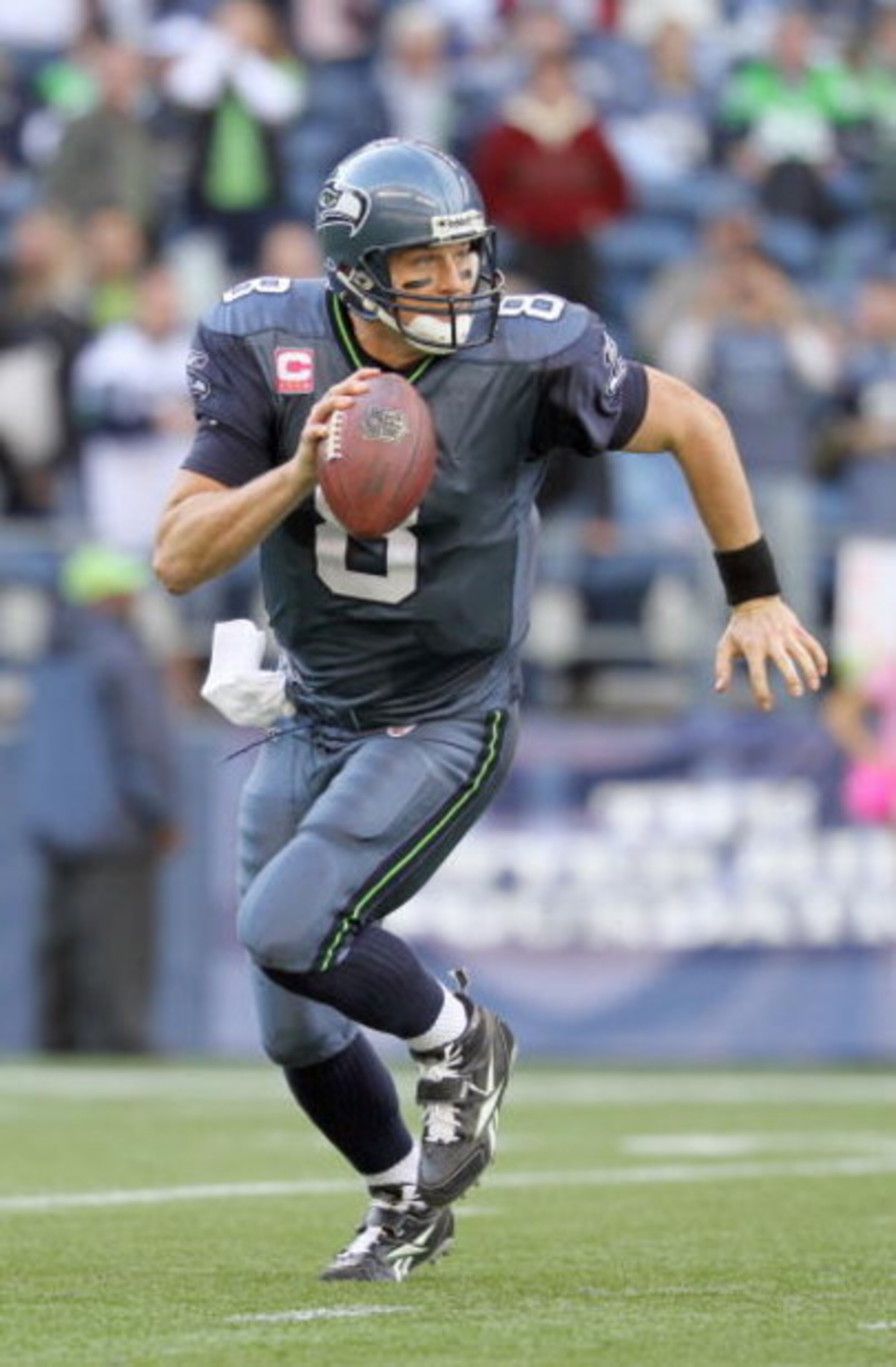 SEATTLE - OCTOBER 18:  Quarterback Matt Hasselbeck #8 of the Seattle Seahawks moves to pass the ball during the game against the Arizona Cardinals on October 18, 2009 at Qwest Field in Seattle, Washington. (Photo by Otto Greule Jr/Getty Images) 