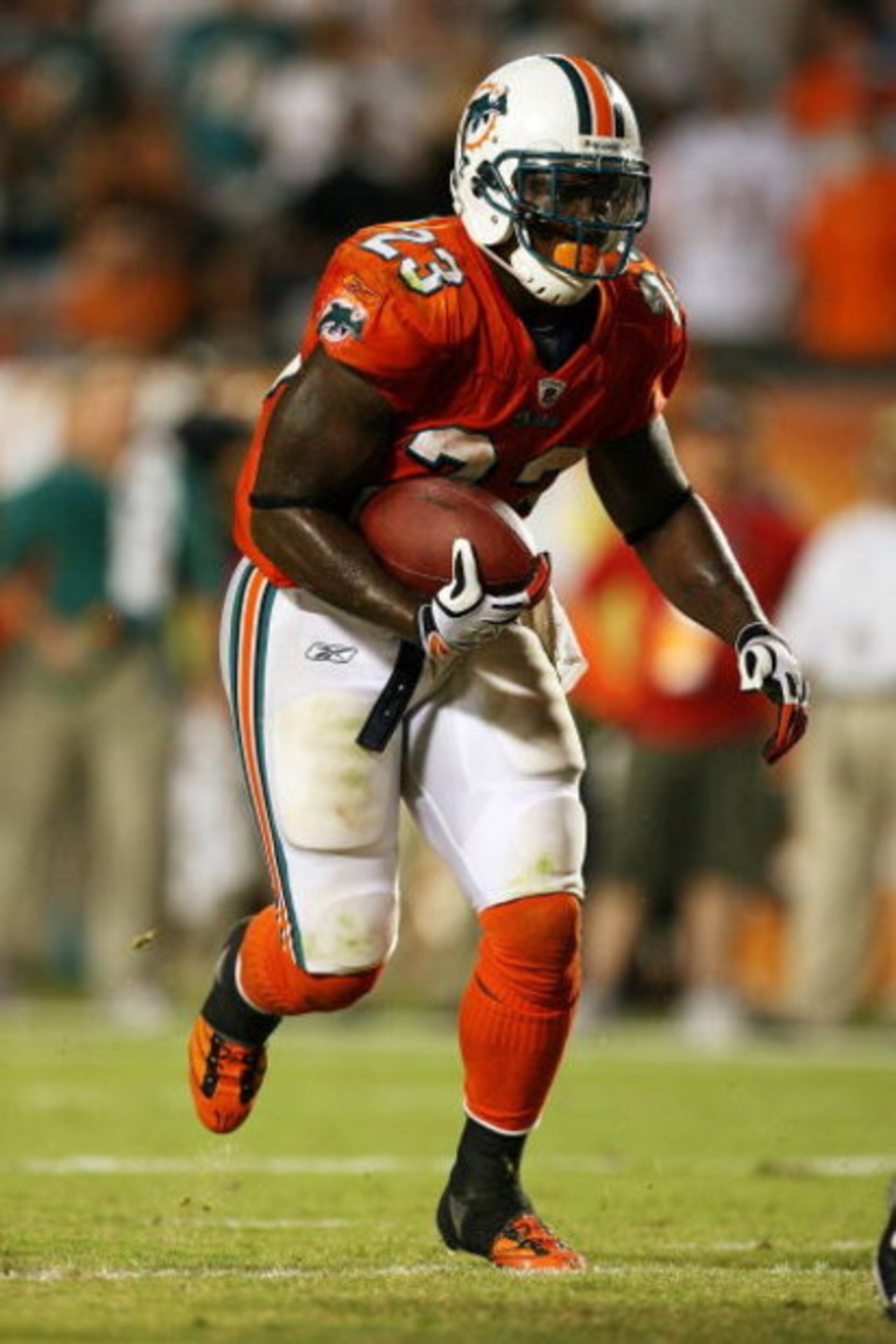 MIAMI - OCTOBER 12:  Running back Ronnie Brown #23 of the Miami Dolphins looks for room to run against the New York Jets at Land Shark Stadium on October 12, 2009 in Miami, Florida. The Dolphins defeated the Jets 31-27. (Photo by Doug Benc/Getty Images)