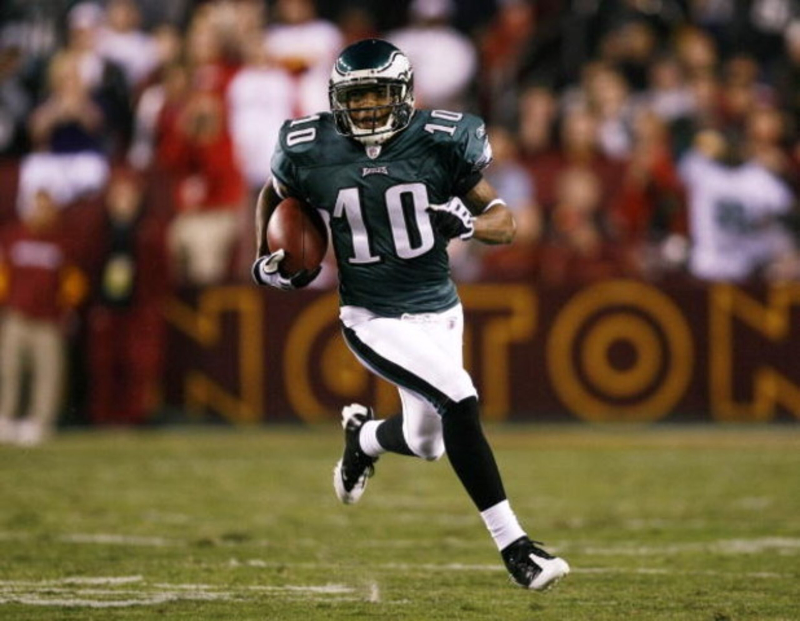 LANDOVER, MD - OCTOBER 26:  DeSean Jackson #10 of the Philadelphia Eagles runs with the ball for a 67 yard touchdown in the first quarter of the game against the Washington Redskins  at FedEx Field October 26, 2009 in Landover, Maryland. (Photo by Win McN
