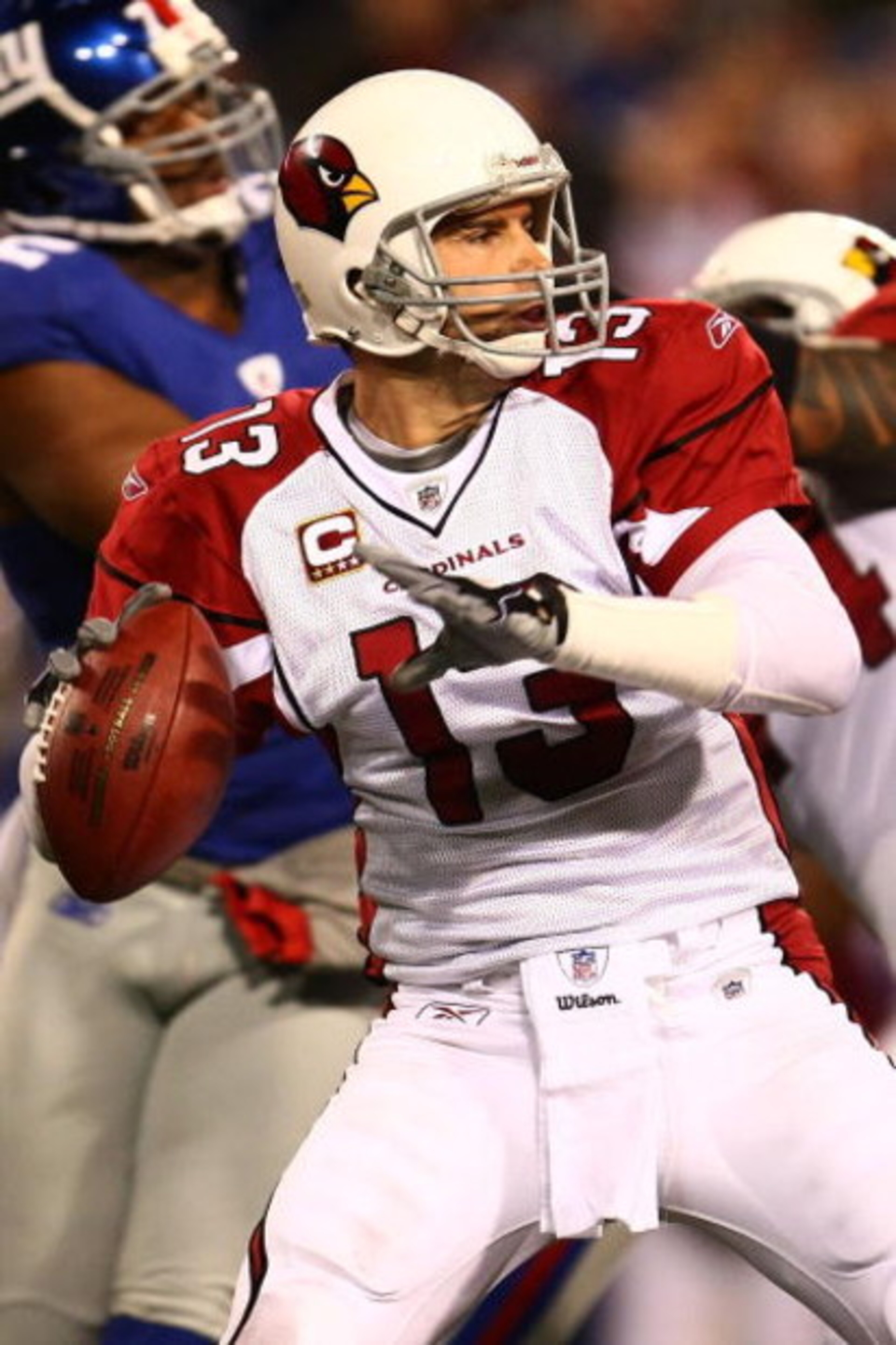 EAST RUTHERFORD, NJ - OCTOBER 25:  Kurt Warner #13 of the Arizona Cardinals looks to pass against the New York Giants on October 25, 2009 at Giants Stadium in East Rutherford, New Jersey.  (Photo by Chris McGrath/Getty Images)
