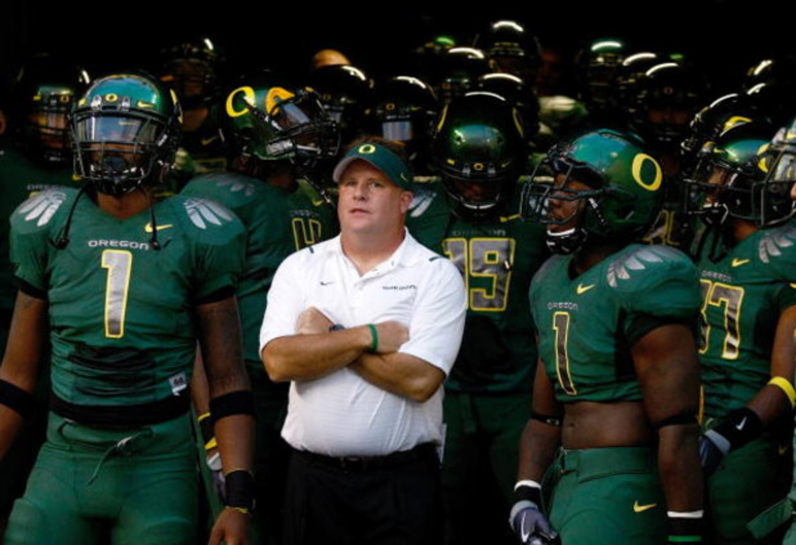 EUGENE, OR - SEPTEMBER 12:  Head Coach Chip Kelly of the Oregon Ducks waits to enter the field before the game against the Purdue Boilermakers  at Autzen Stadium on September 12, 2009 in Eugene, Oregon.  (Photo by Jonathan Ferrey/Getty Images)