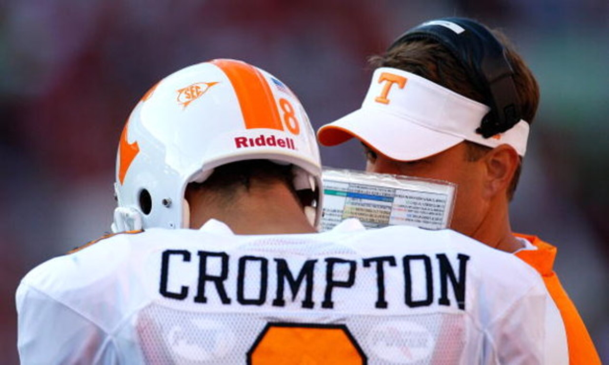 TUSCALOOSA, AL - OCTOBER 24:  Head coach Lane Kiffin of the Tennessee Volunteers converses with quarterback Jonathan Crompton #8 against the Alabama Crimson Tide at Bryant-Denny Stadium on October 24, 2009 in Tuscaloosa, Alabama.  (Photo by Kevin C. Cox/G