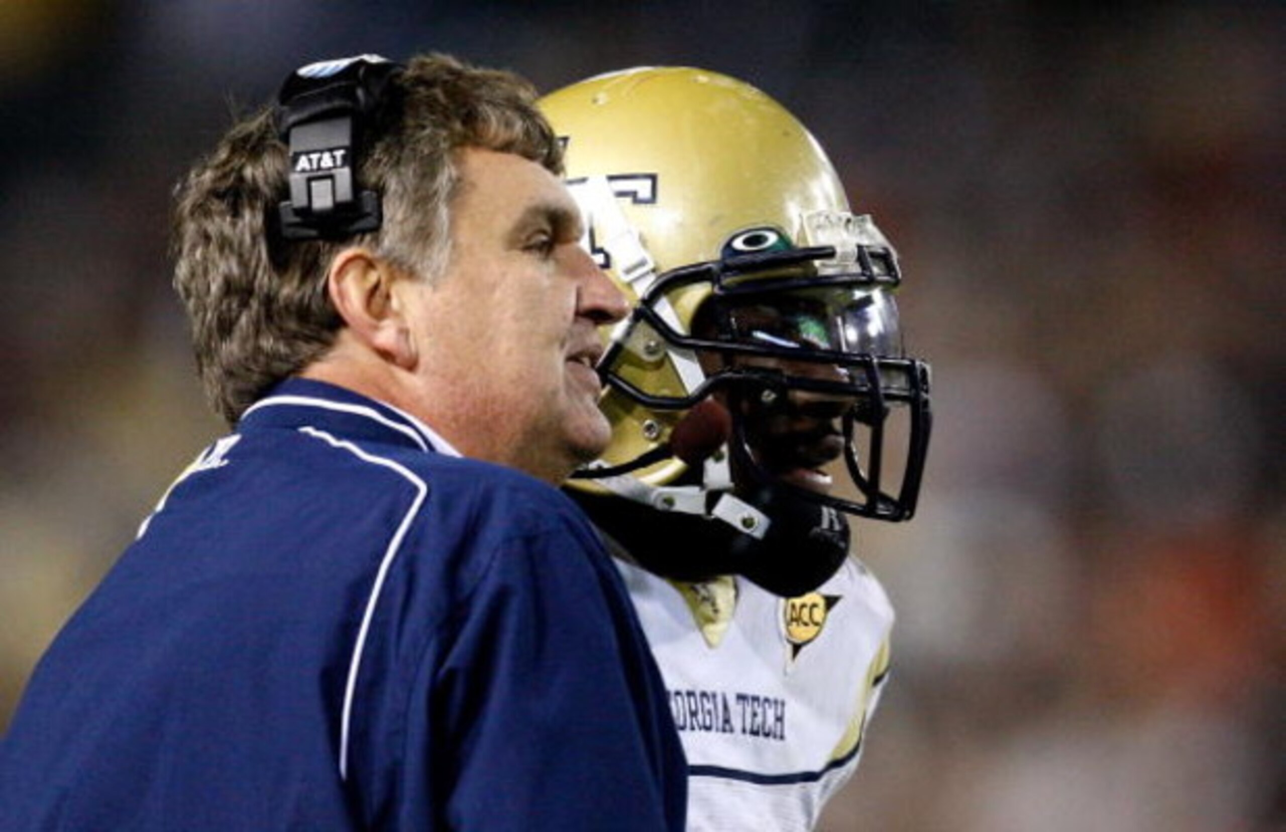 ATLANTA - OCTOBER 17:  Head coach Paul Johnson (L) of the Georgia Tech Yellow Jackets converses with quarterback Josh Nesbitt #9 after his touchdown against the Virginia Tech Hokies at Bobby Dodd Stadium on October 17, 2009 in Atlanta, Georgia.  (Photo by