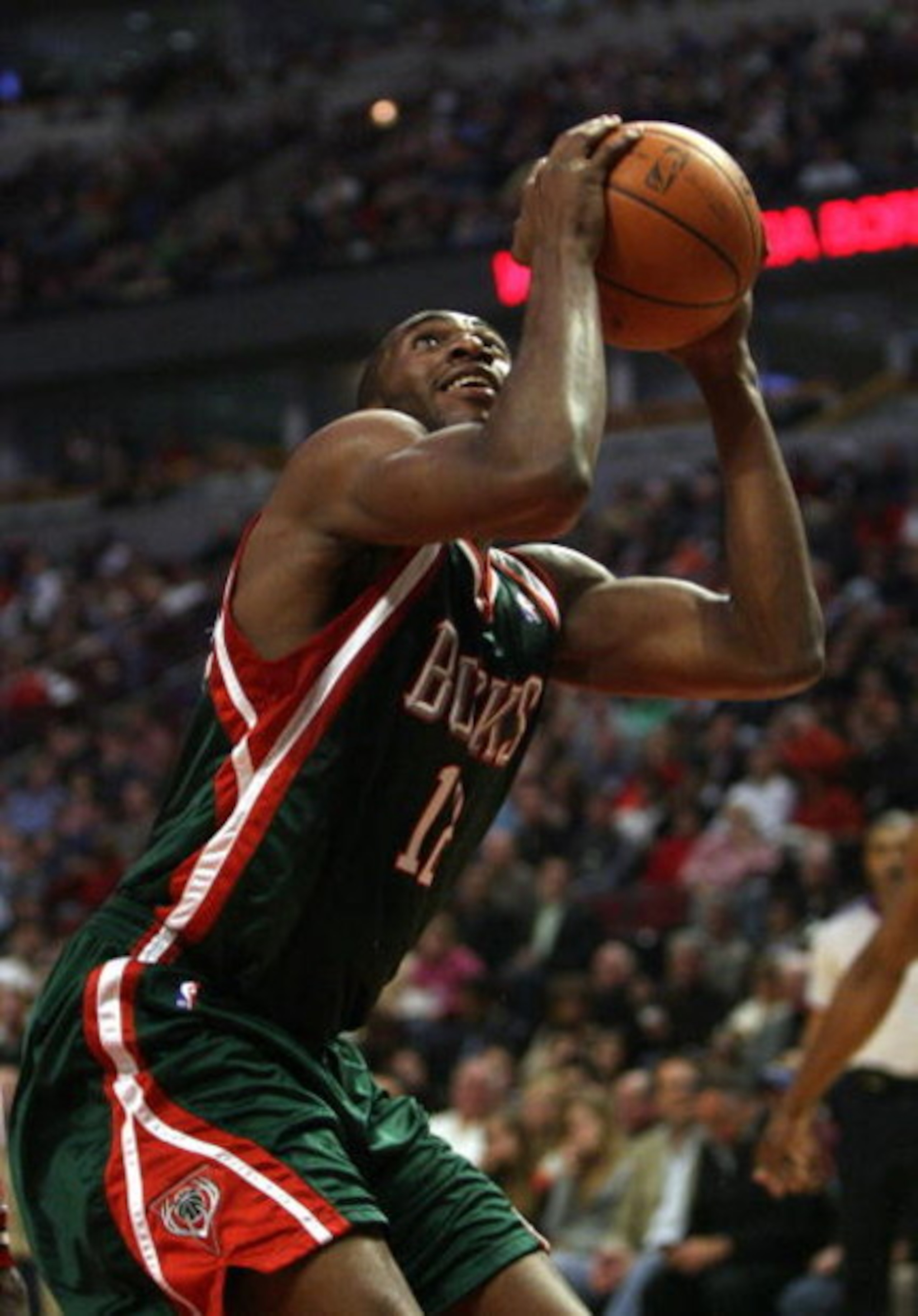 CHICAGO - MARCH 06:  Luc Mbah a Moute #12 of the Milwaukee Bucks looks to go up for a shot under the basket against the Chicago Bulls at the United Center on March 6, 2009 in Chicago, Illinois.  NOTE TO USER: User expressly acknowledges and agreees that, 
